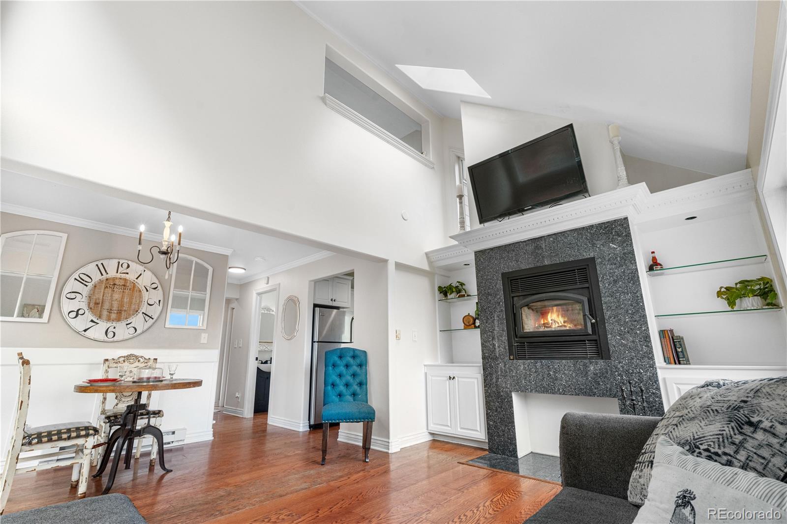 137 Bob Cat Trail Bailey, CO 80421 - Photo 9 of 46 a living room with furniture and a fireplace