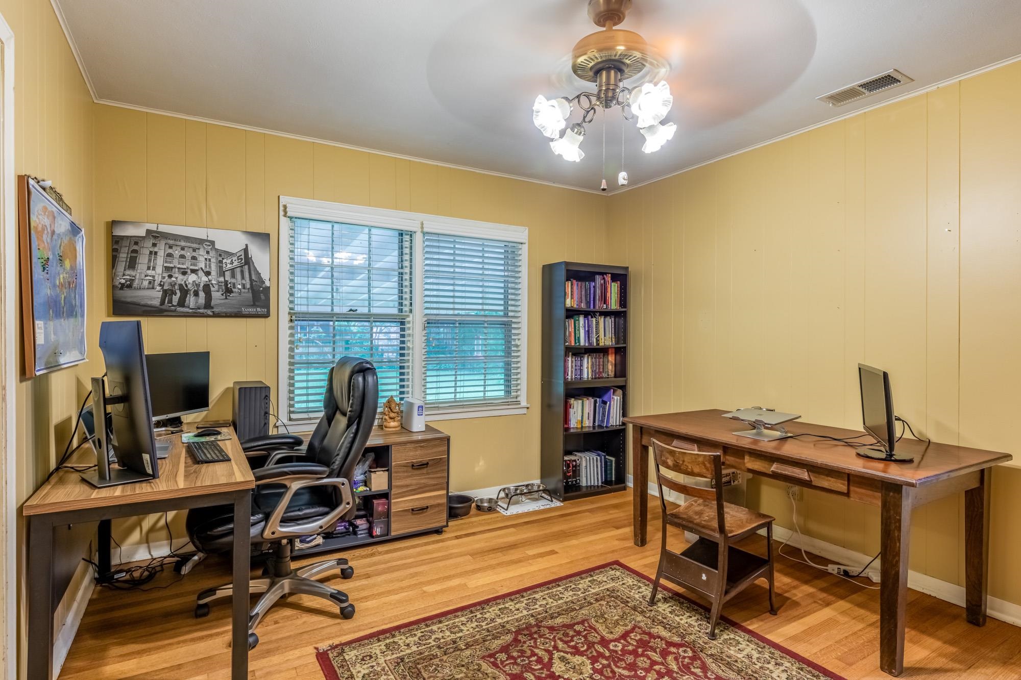 4313 Rhodes Avenue Memphis, TN 38111 - Photo 19 of 25 a view of a workspace with furniture and a window