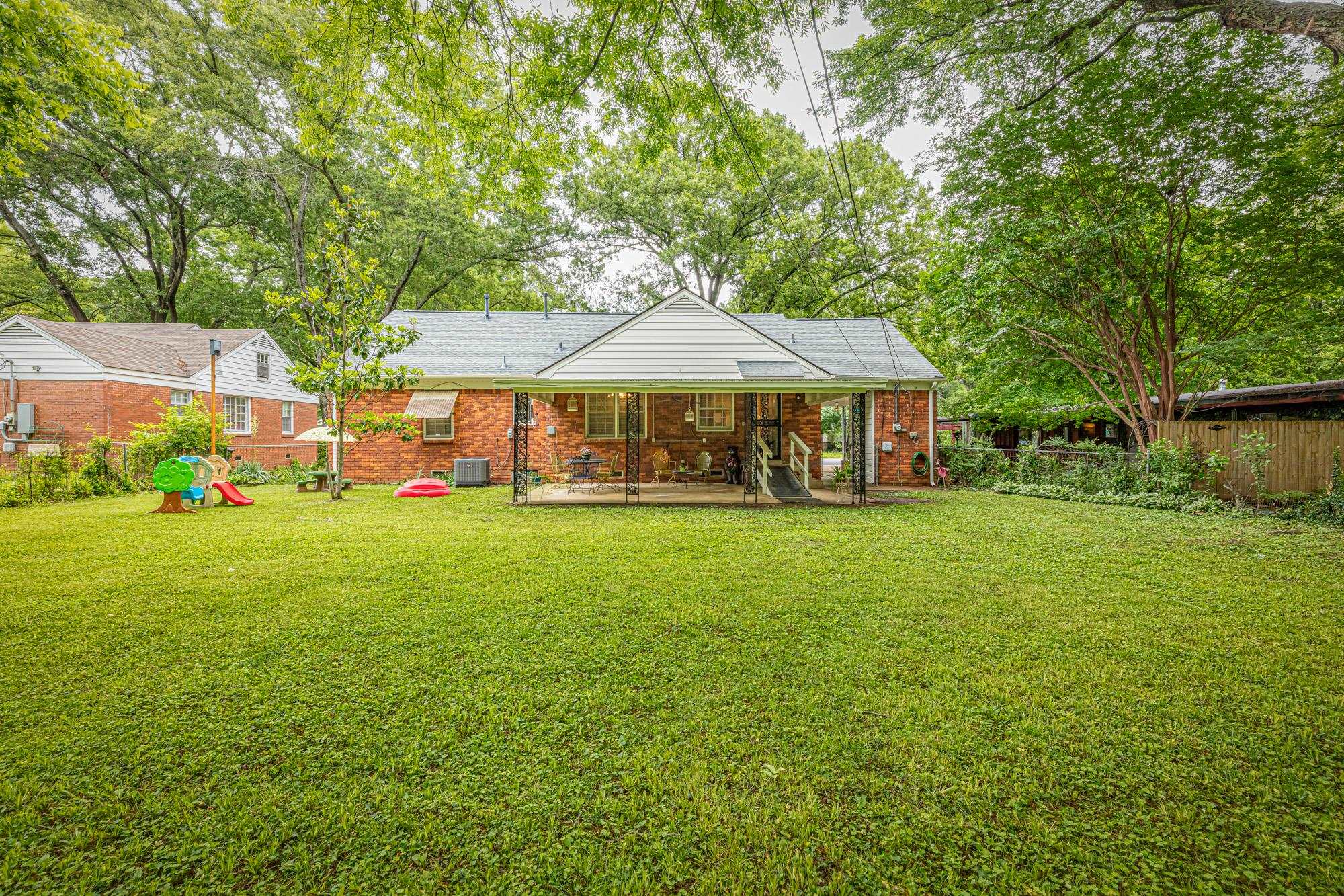 4313 Rhodes Avenue Memphis, TN 38111 - Photo 25 of 25 a front view of a house with garden