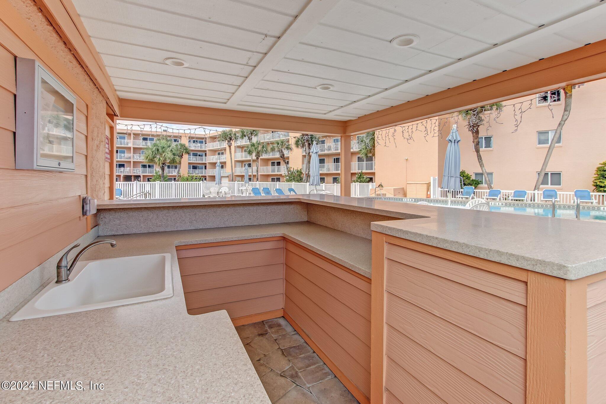 4 Ocean Trace Road, Unit 214 St. Augustine Beach, FL 32080 - Photo 15 of 20 Pool Cabana