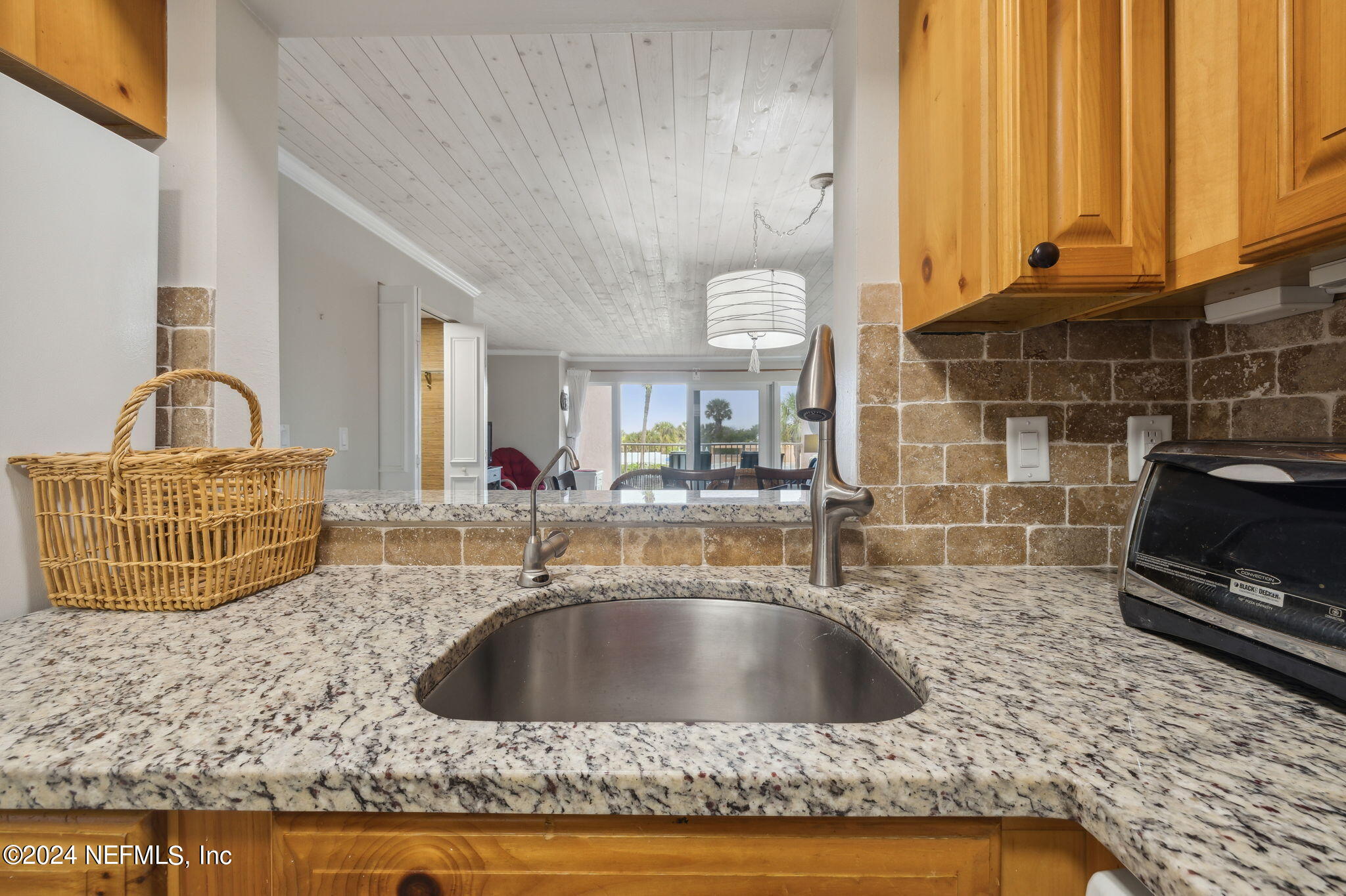 4 Ocean Trace Road, Unit 214 St. Augustine Beach, FL 32080 - Photo 7 of 20 Kitchen to Dining Room