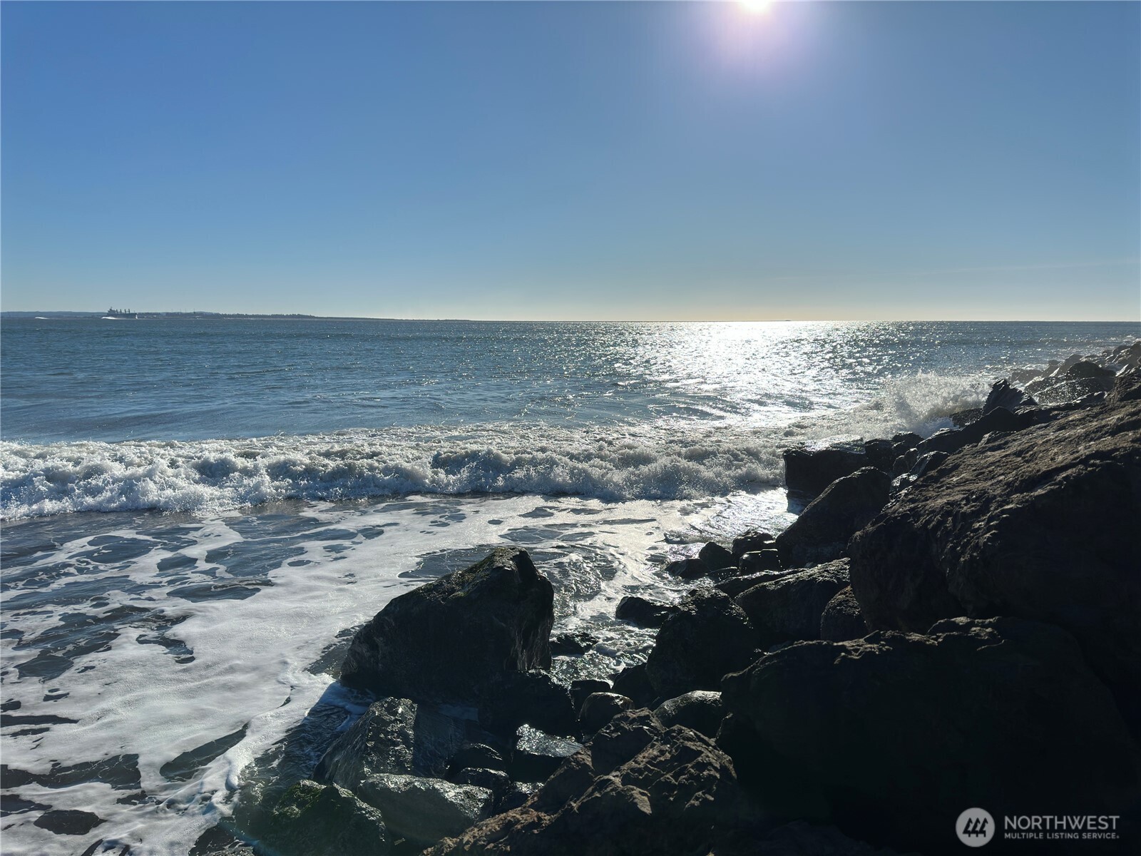 609 Weatherwax Loop Northeast Ocean Shores, WA 98569 - Photo 8 of 12 a view of beach and ocean