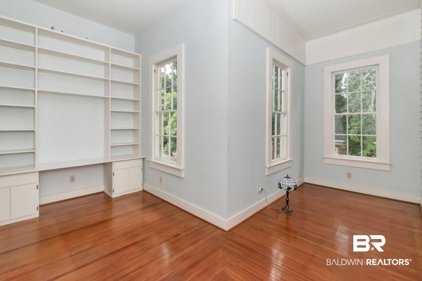 959 Dauphin Street Mobile, AL 36604 - Photo 25 of 43 Unfurnished room featuring a wealth of natural light and hardwood / wood-style flooring