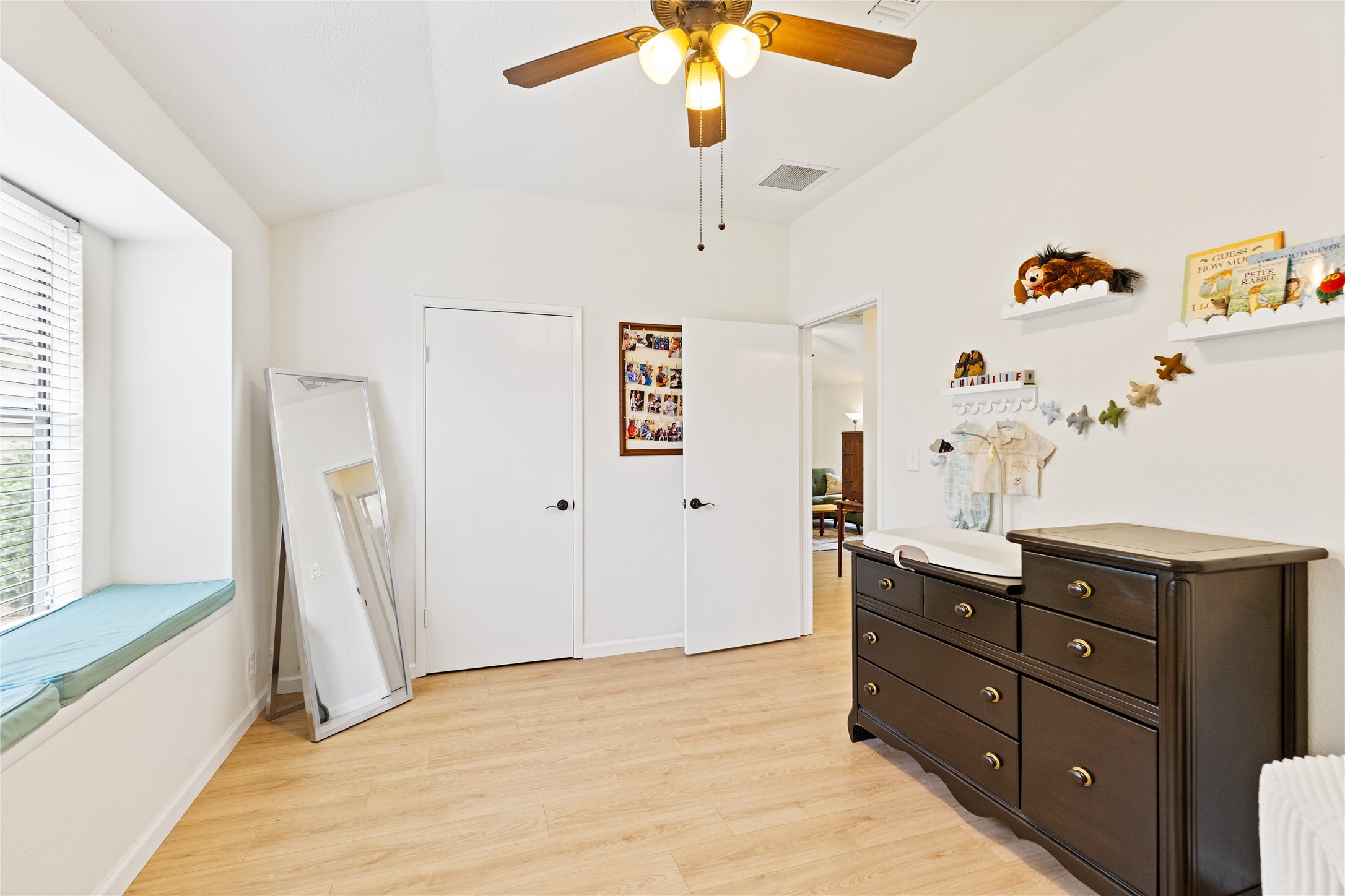 9719 Orangevale Drive Spring, TX 77379 - Photo 22 of 32 Another image of secondary bedroom with beautiful wood flooring and large closet.