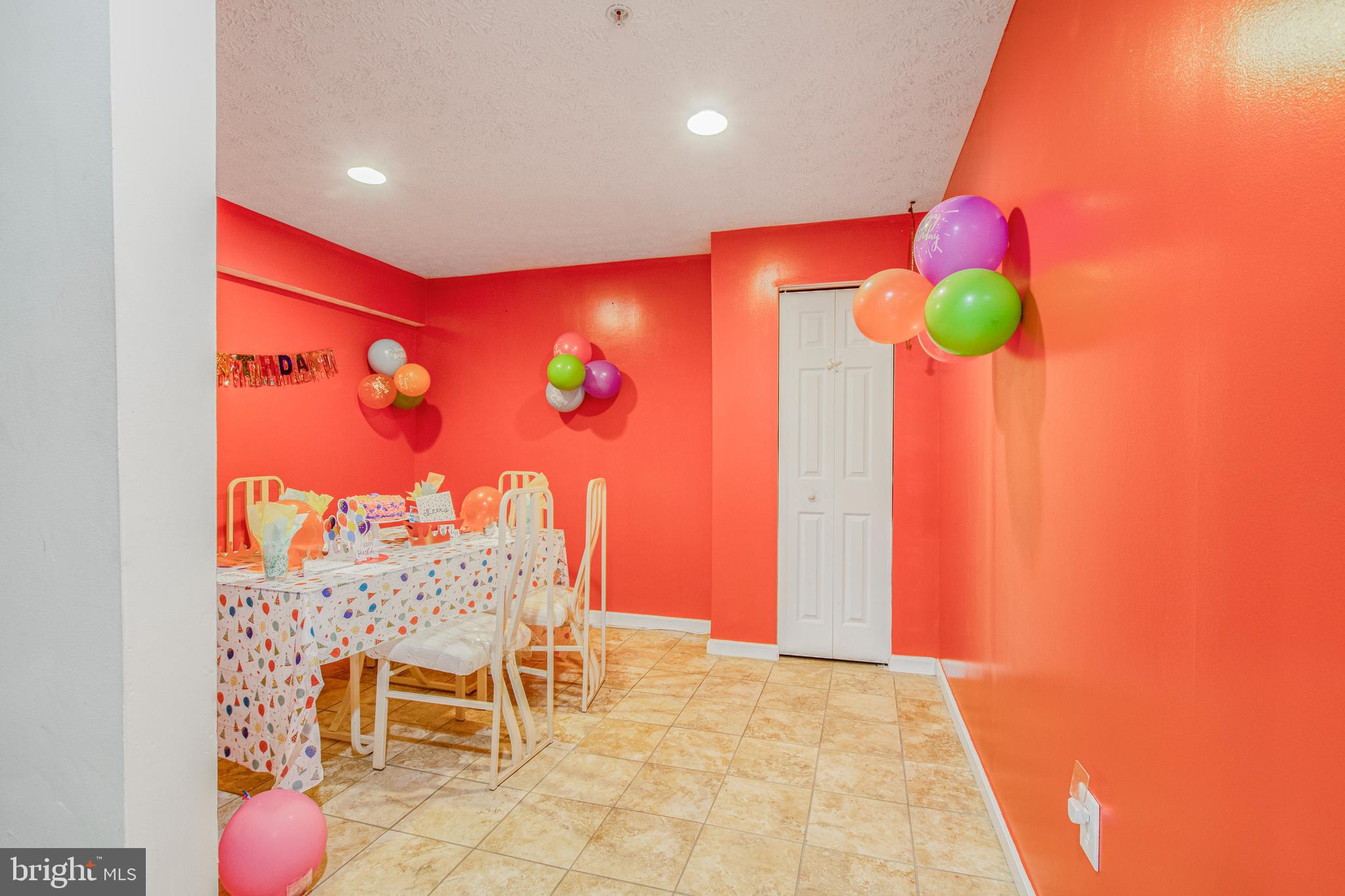 11809 Old Fort Road Fort Washington, MD 20744 - Photo 11 of 40 a view of a room with a table and chairs