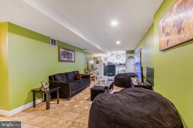 a living room with furniture and a couch