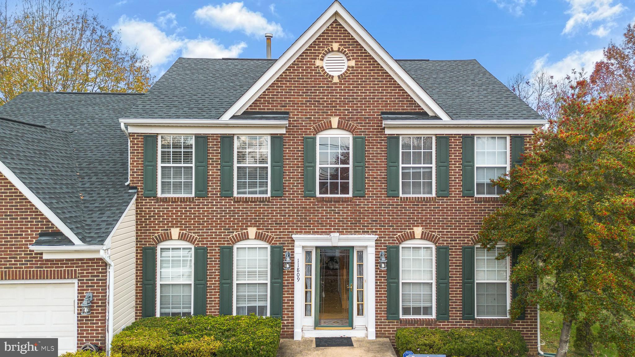 11809 Old Fort Road Fort Washington, MD 20744 - Photo 3 of 40 a front view of a house with a yard