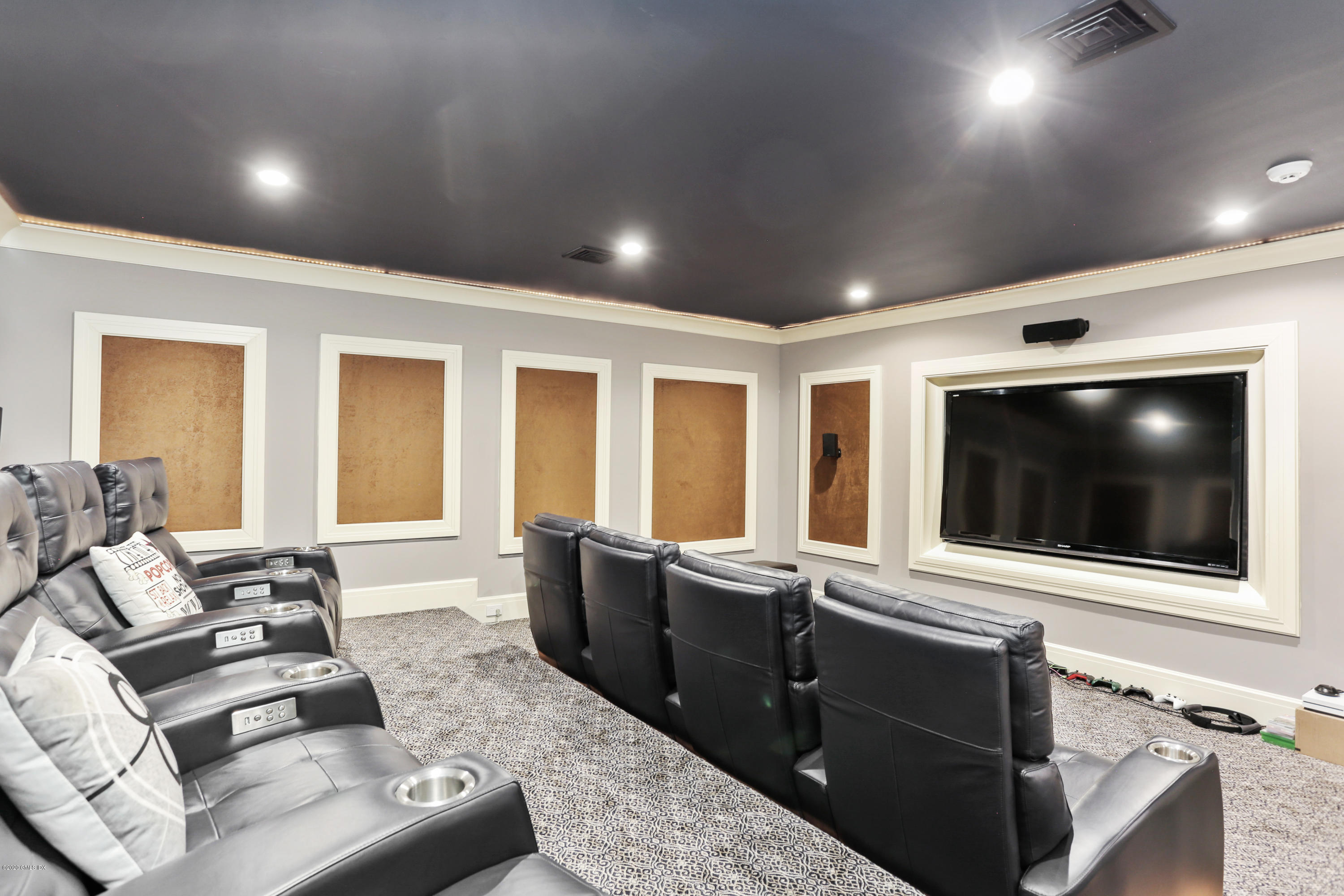 125 Cat Rock Road Cos Cob, CT 06807 - Photo 11 of 33 a living room with furniture and a flat screen tv