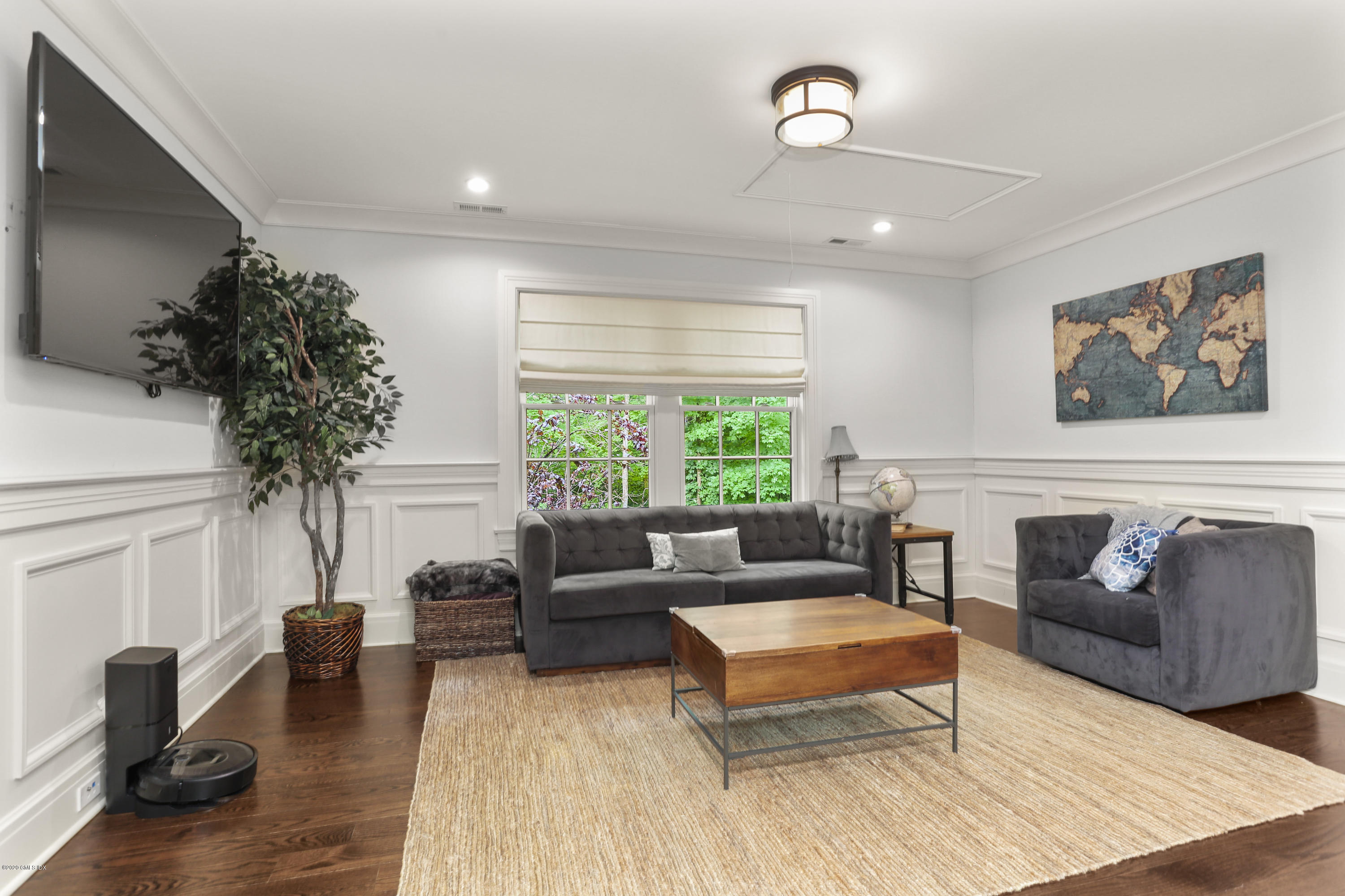 125 Cat Rock Road Cos Cob, CT 06807 - Photo 15 of 33 a living room with furniture and a large window