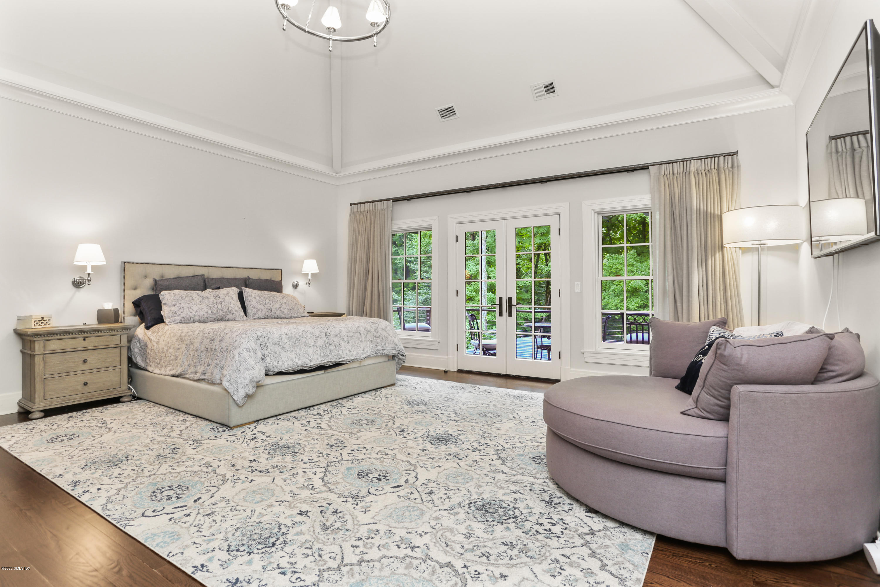 125 Cat Rock Road Cos Cob, CT 06807 - Photo 18 of 33 a bedroom with a bed and couch