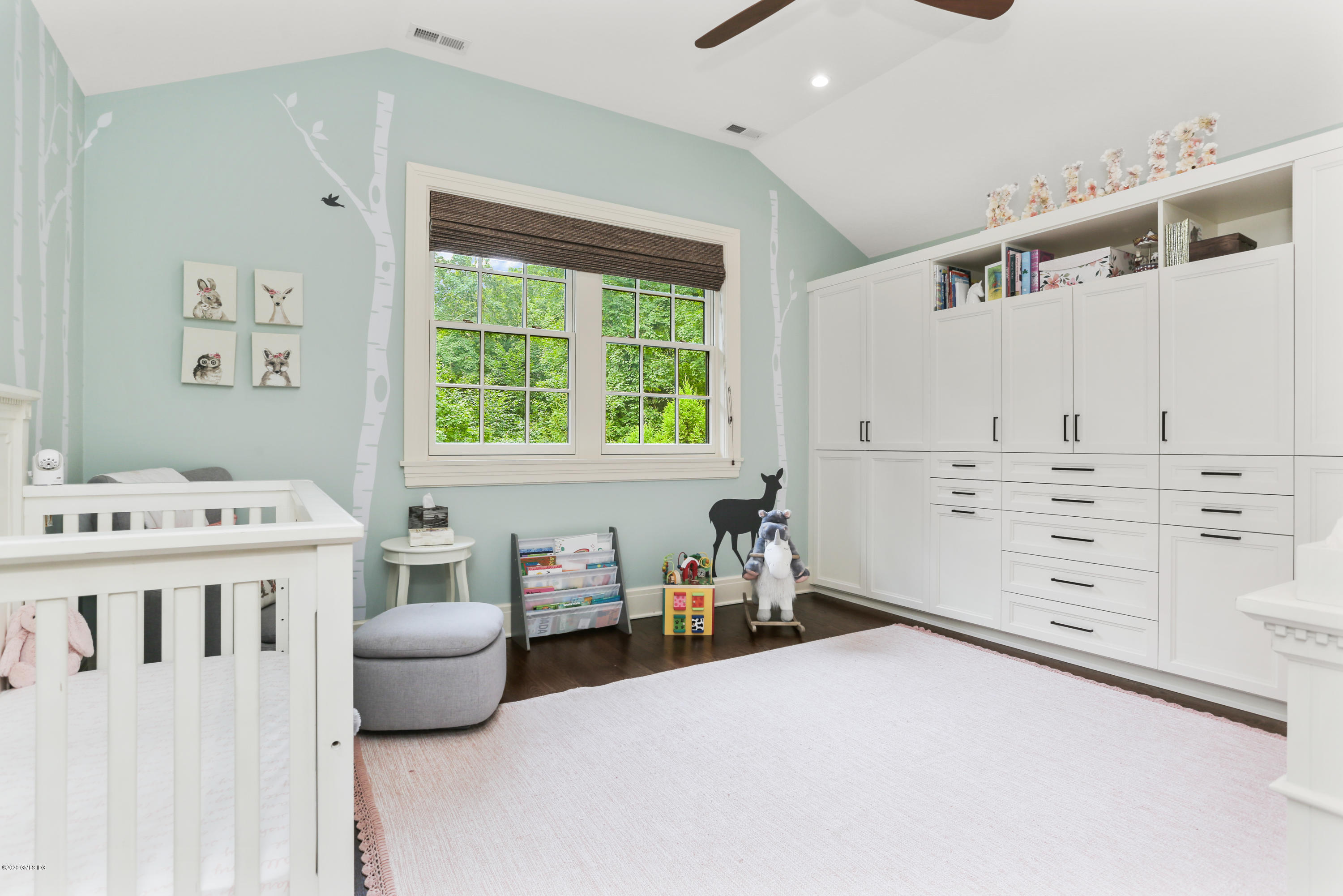 125 Cat Rock Road Cos Cob, CT 06807 - Photo 19 of 33 a bedroom with a bed and a window