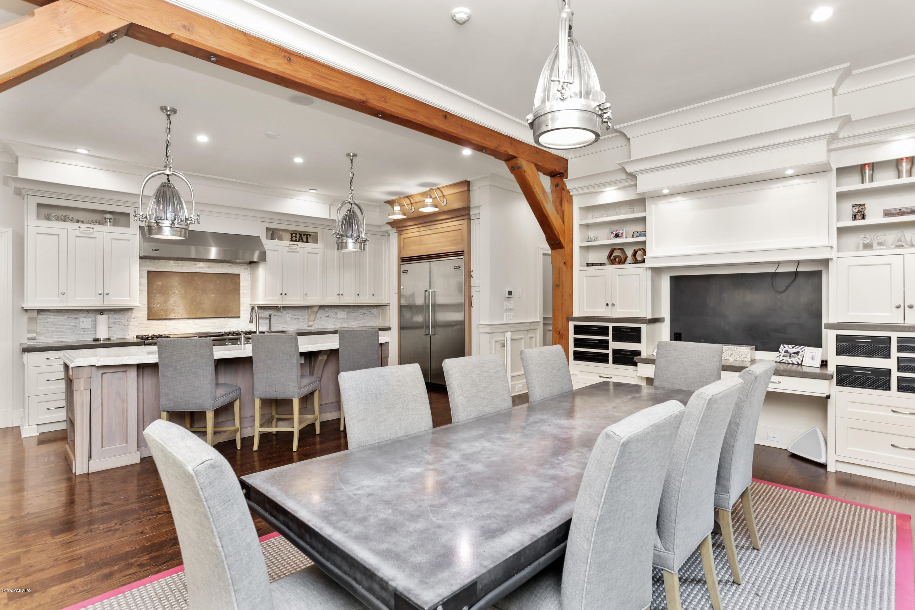 125 Cat Rock Road Cos Cob, CT 06807 - Photo 2 of 33 a view of a dining room with furniture window and wooden floor