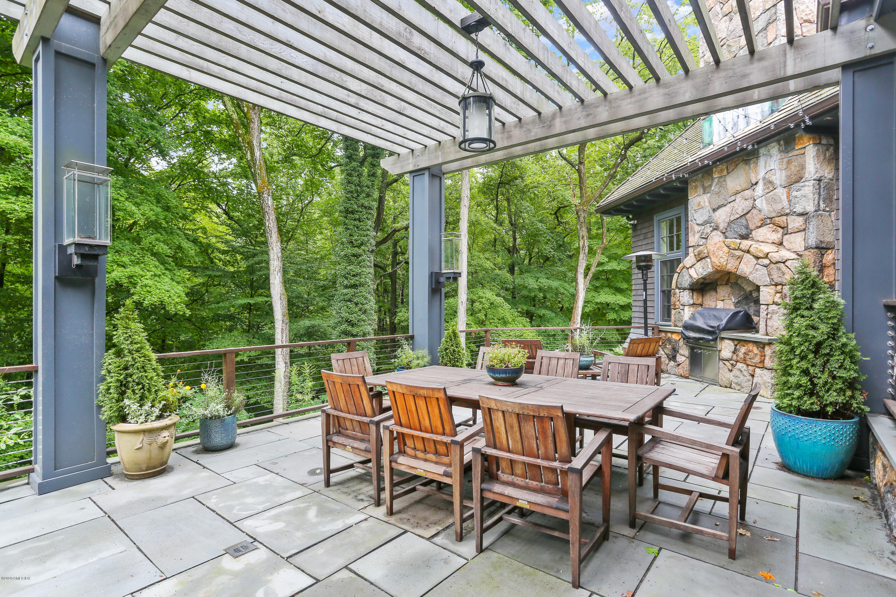 125 Cat Rock Road Cos Cob, CT 06807 - Photo 26 of 33 a view of a patio with chairs and plants