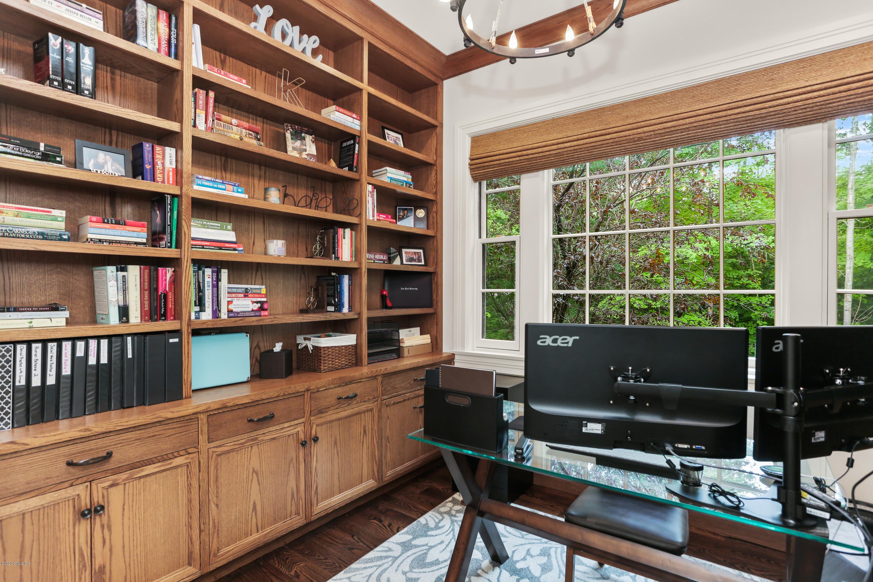 125 Cat Rock Road Cos Cob, CT 06807 - Photo 8 of 33 a reading room with furniture and a book shelf