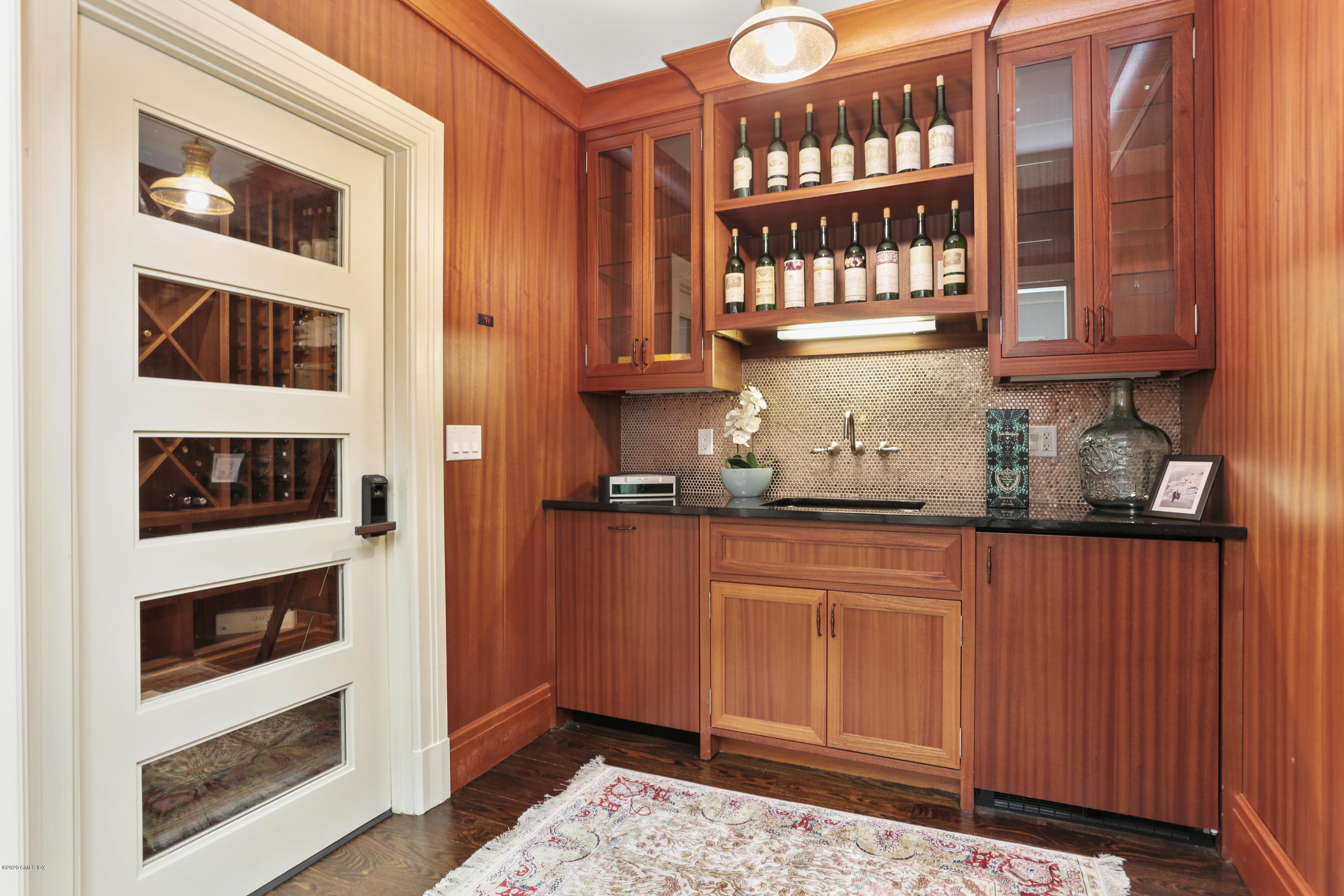 125 Cat Rock Road Cos Cob, CT 06807 - Photo 10 of 33 a kitchen with stainless steel appliances granite countertop a stove and a microwave