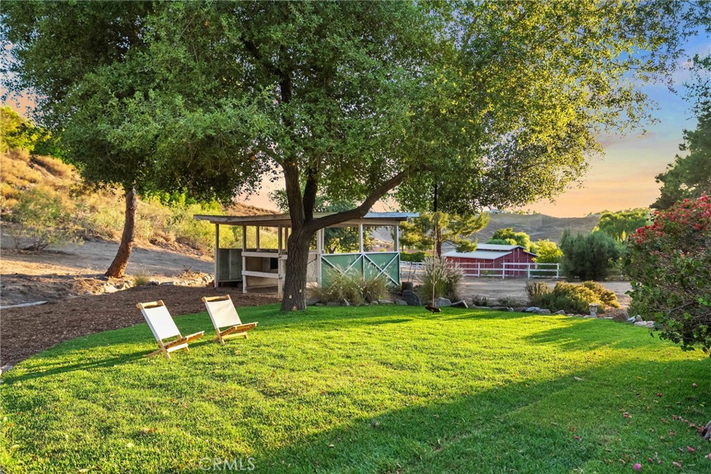 42333 Casa Verde Temecula, CA 92592 - Photo 21 of 44 a view of a house with a yard porch and sitting area