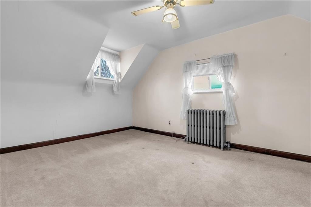 643 Agnew Road Pittsburgh, PA 15227 - Photo 21 of 49 a view of a livingroom with a staircase