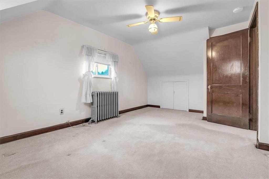 643 Agnew Road Pittsburgh, PA 15227 - Photo 22 of 49 an empty room with windows and entrance