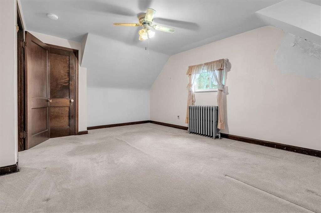 643 Agnew Road Pittsburgh, PA 15227 - Photo 25 of 49 an empty room with closet and windows