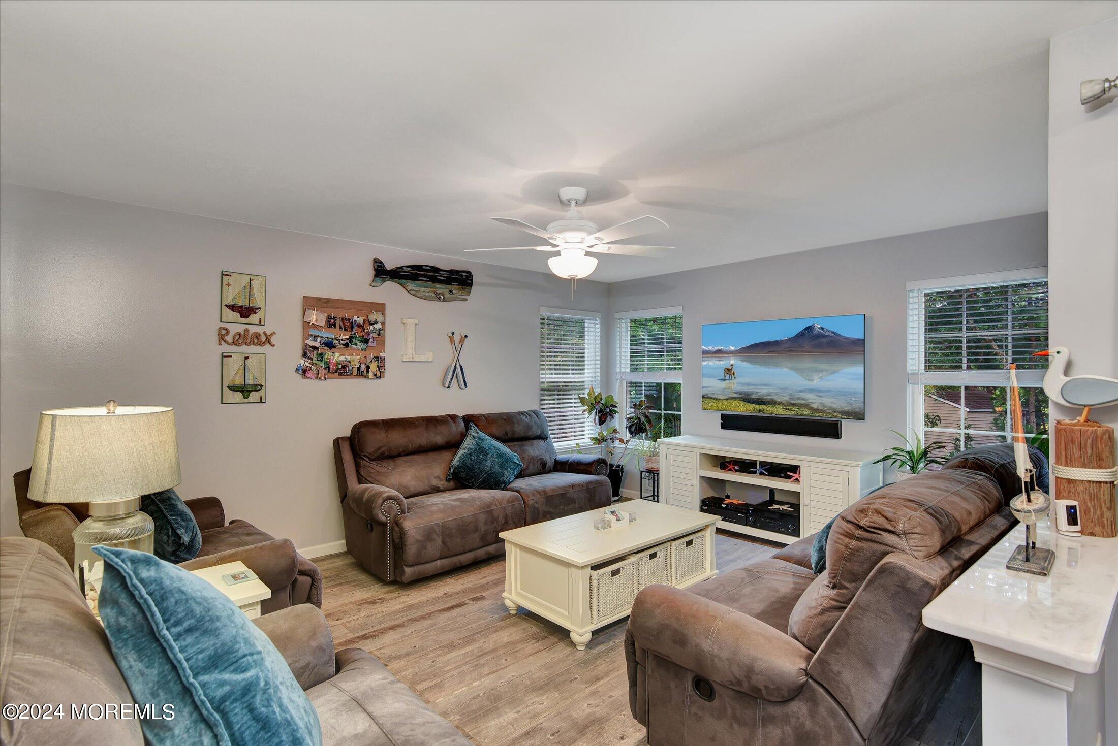 29 Nate Lane Howell, NJ 07731 - Photo 14 of 42 a living room with furniture and a flat screen tv
