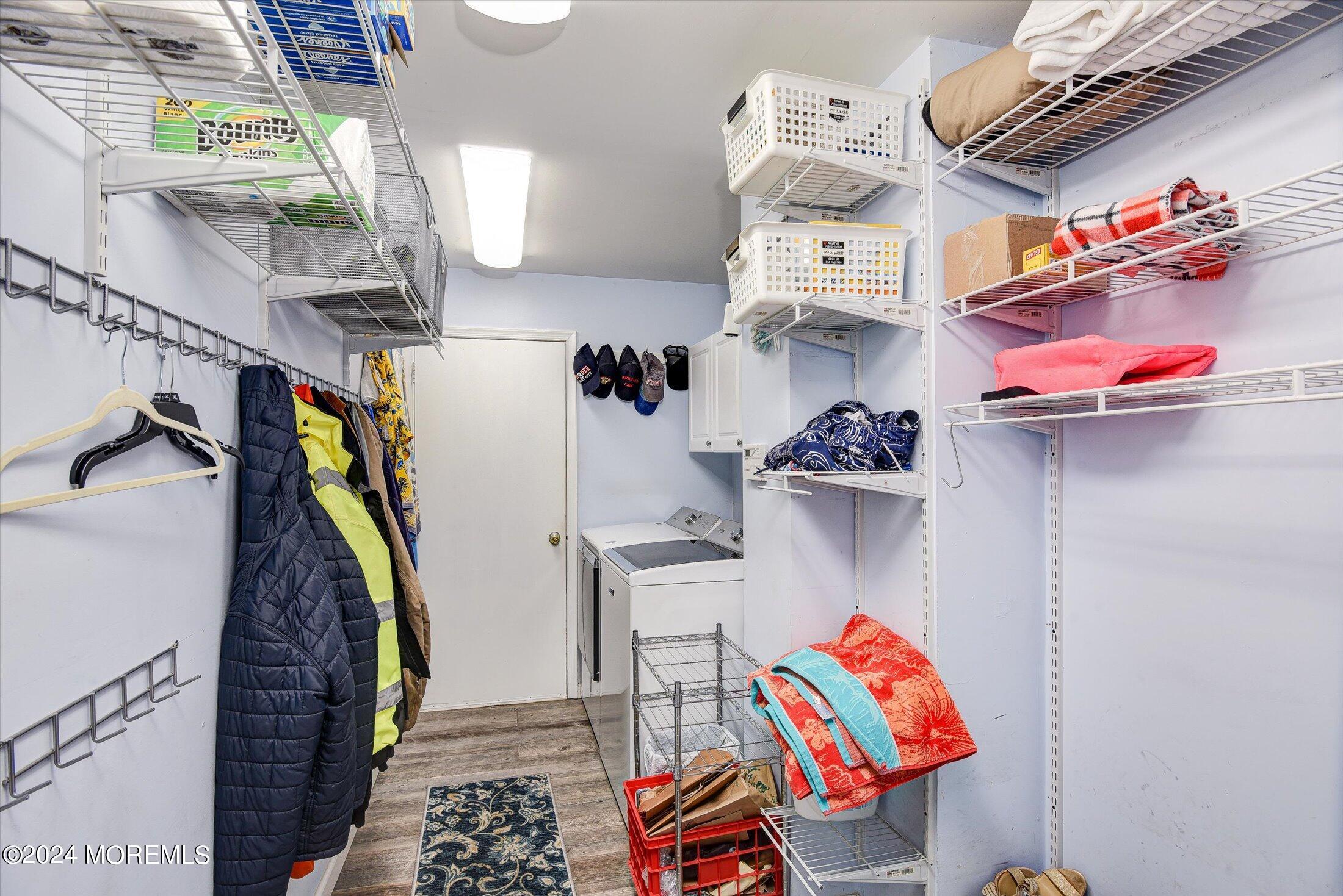 29 Nate Lane Howell, NJ 07731 - Photo 15 of 42 a view of walk in closet with clothes and shoes