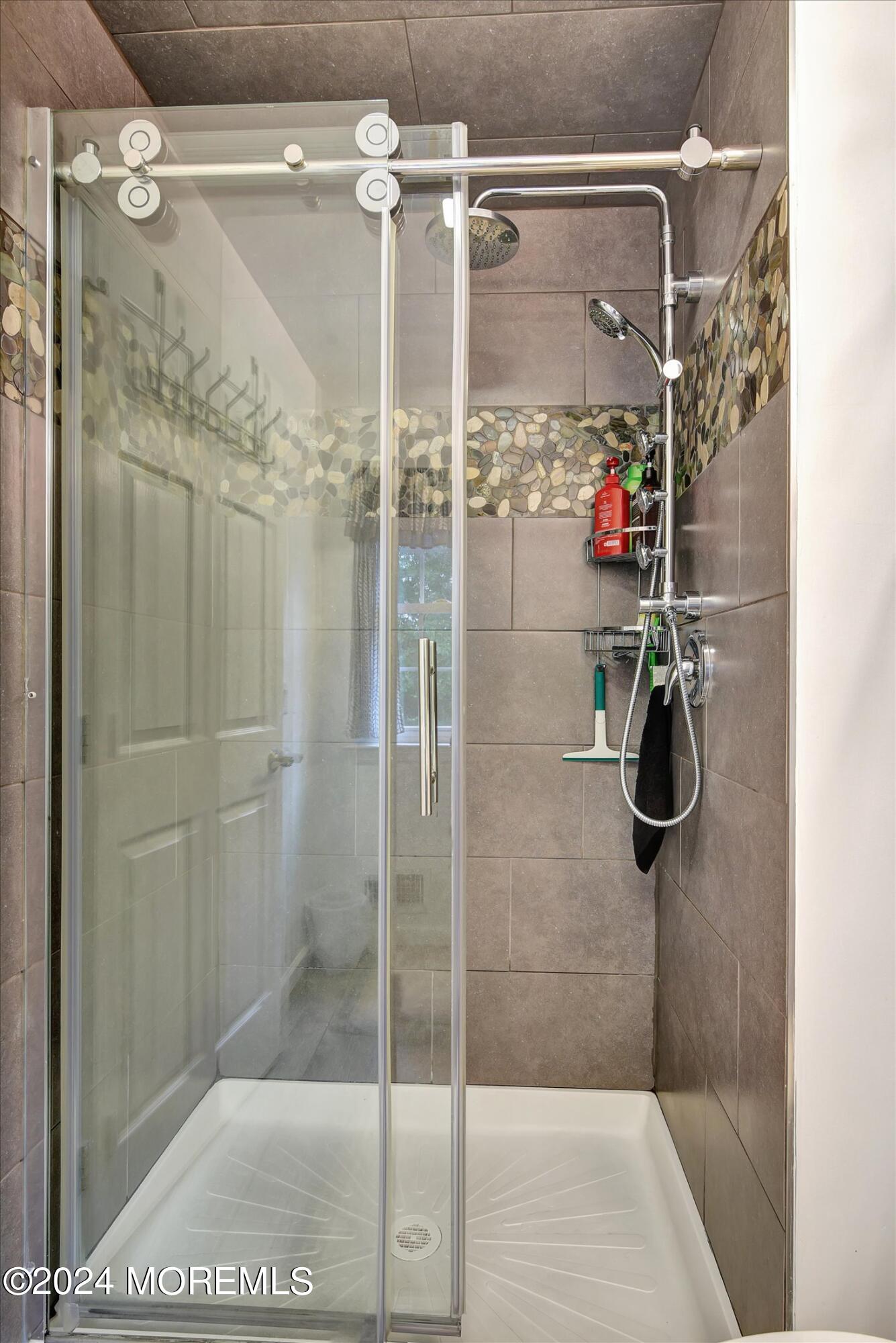 29 Nate Lane Howell, NJ 07731 - Photo 25 of 42 a bathroom with a shower