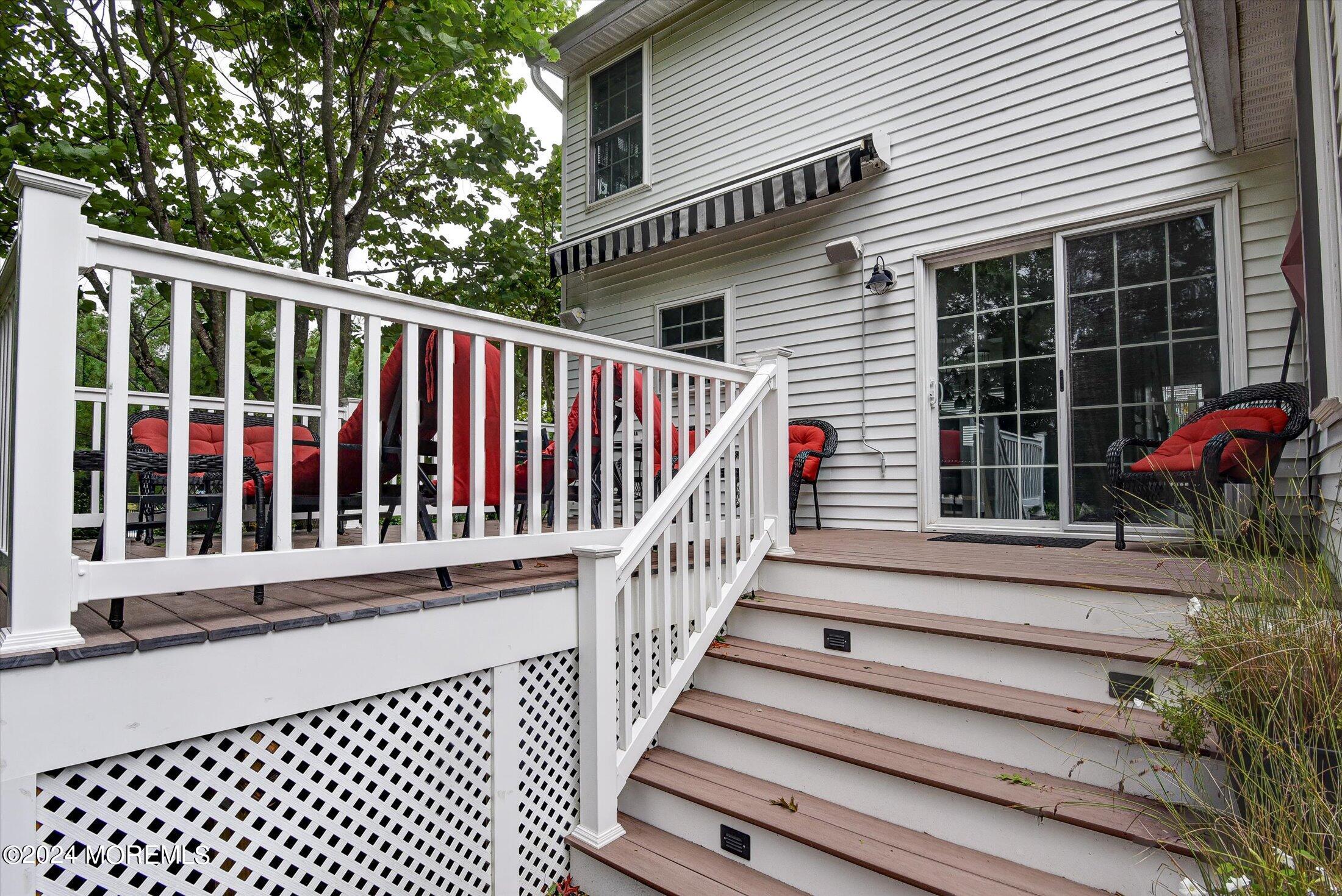 29 Nate Lane Howell, NJ 07731 - Photo 31 of 42 a view of a deck with a large window