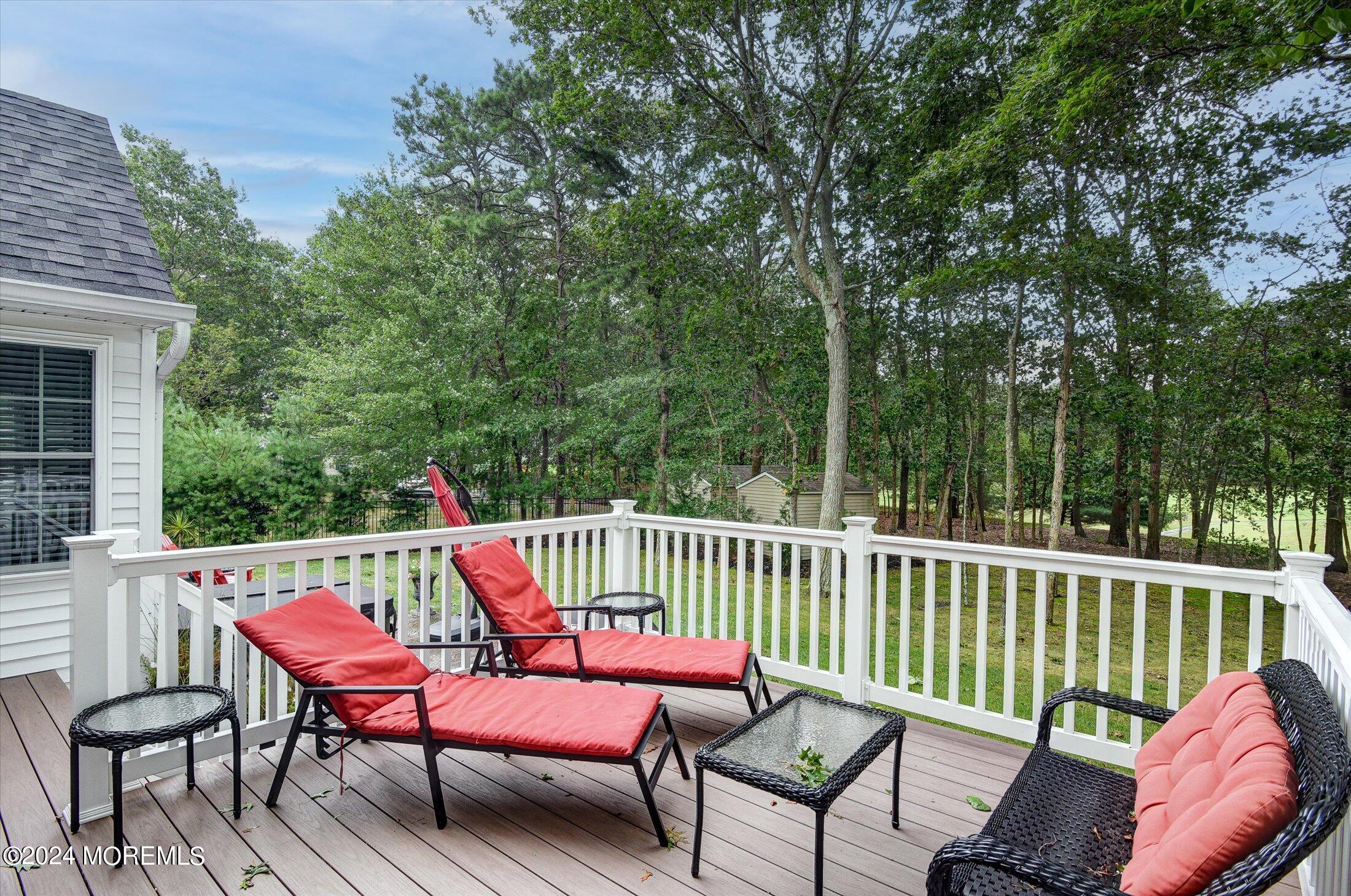 29 Nate Lane Howell, NJ 07731 - Photo 32 of 42 a view of a two chairs in the deck