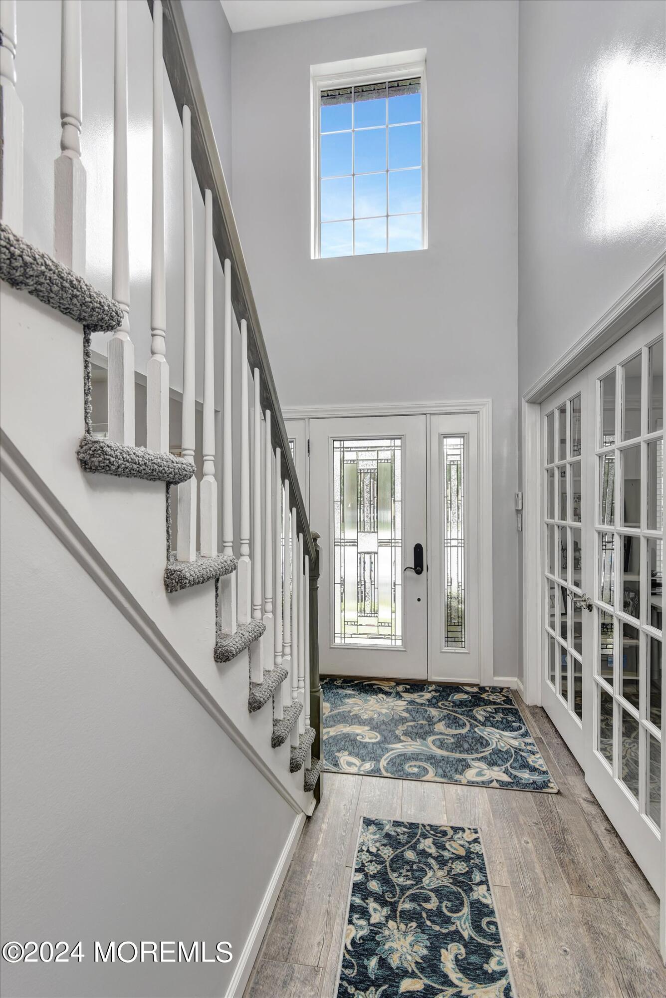 29 Nate Lane Howell, NJ 07731 - Photo 4 of 42 a view of an entryway with staircase