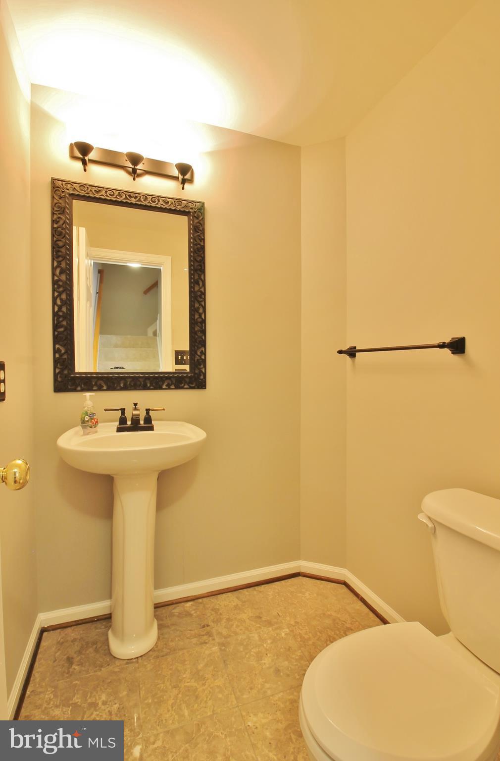 14020 Rockingham Road Germantown, MD 20874 - Photo 14 of 29 Powder room on main level
