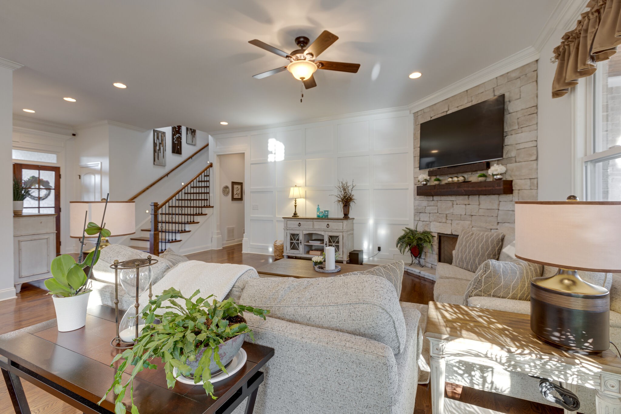 3692 Ronstadt Road Thompson's Station, TN 37179 - Photo 13 of 63 a living room with fireplace furniture and a flat screen tv