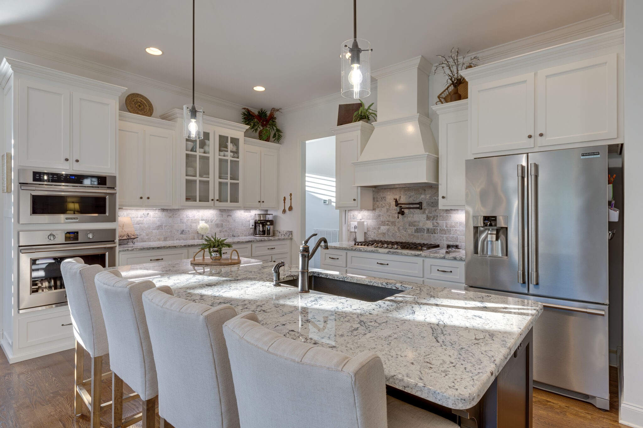 3692 Ronstadt Road Thompson's Station, TN 37179 - Photo 14 of 63 a kitchen with granite countertop a counter space stainless steel appliances and cabinets