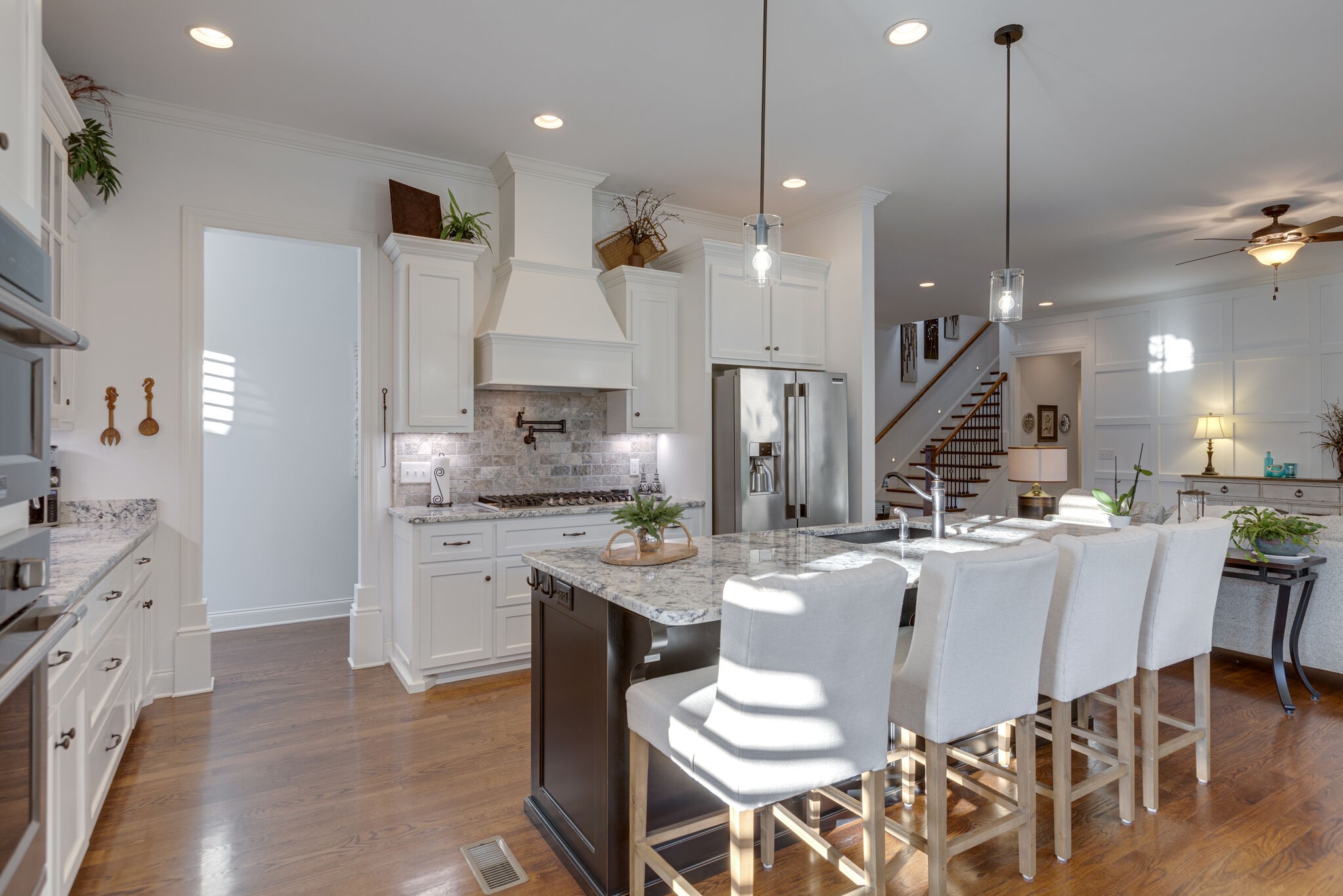 3692 Ronstadt Road Thompson's Station, TN 37179 - Photo 15 of 63 a large kitchen with a table and chairs