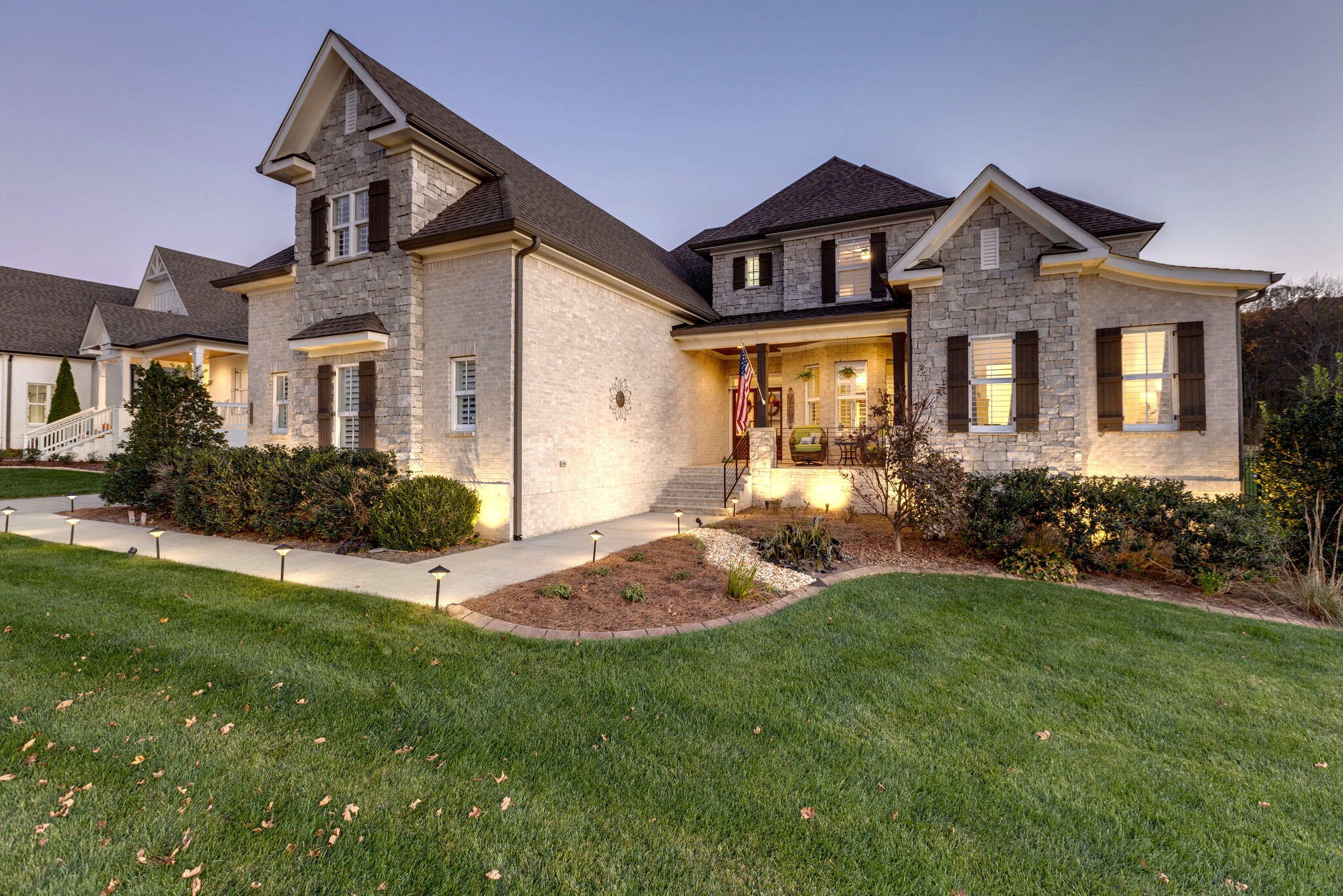 3692 Ronstadt Road Thompson's Station, TN 37179 - Photo 2 of 63 a front view of a house with a yard and garage