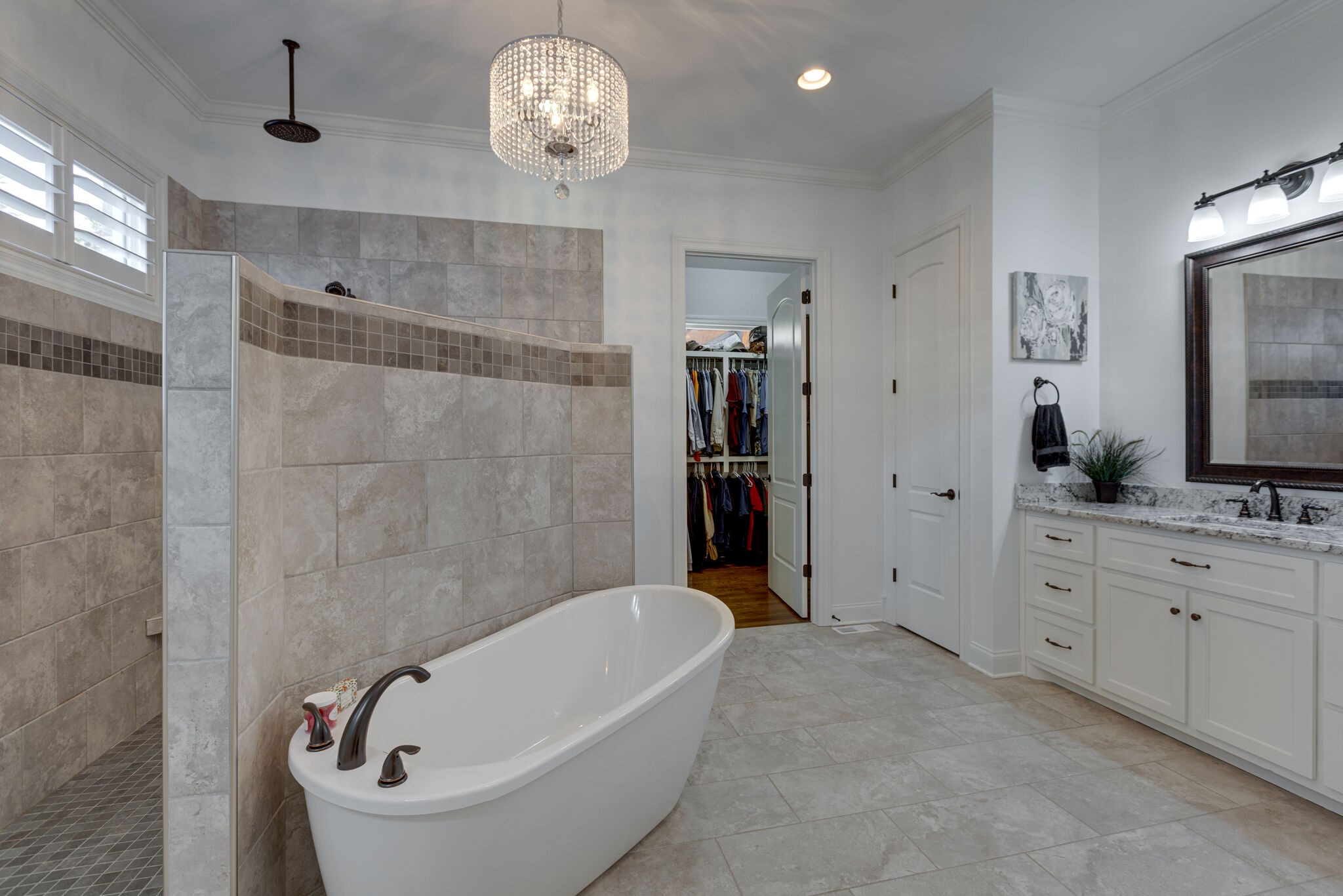 3692 Ronstadt Road Thompson's Station, TN 37179 - Photo 26 of 63 a bathroom with a bathtub and a double vanity sink