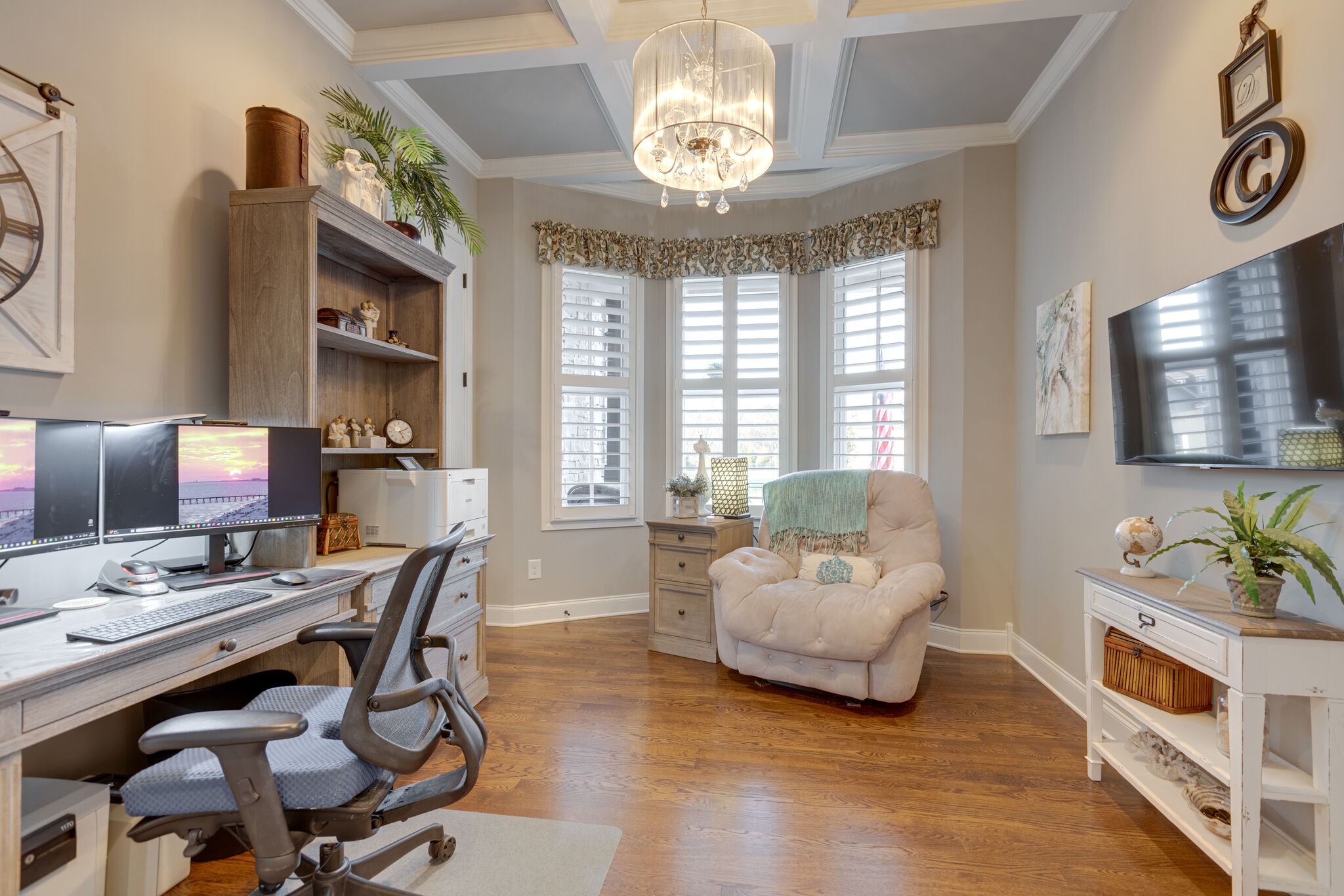3692 Ronstadt Road Thompson's Station, TN 37179 - Photo 28 of 63 a living room with furniture and a chandelier