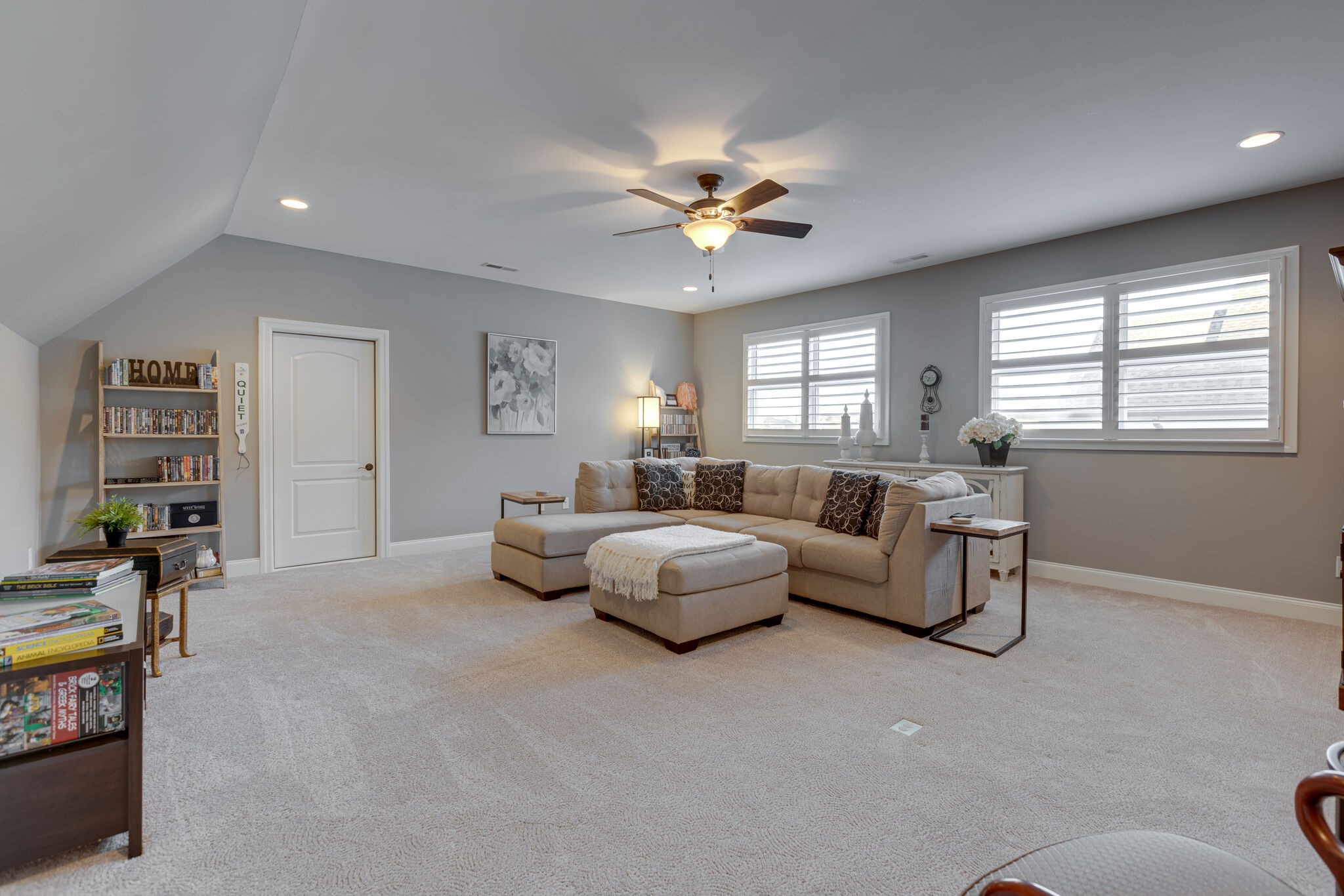 3692 Ronstadt Road Thompson's Station, TN 37179 - Photo 33 of 63 a living room with furniture and a chandelier