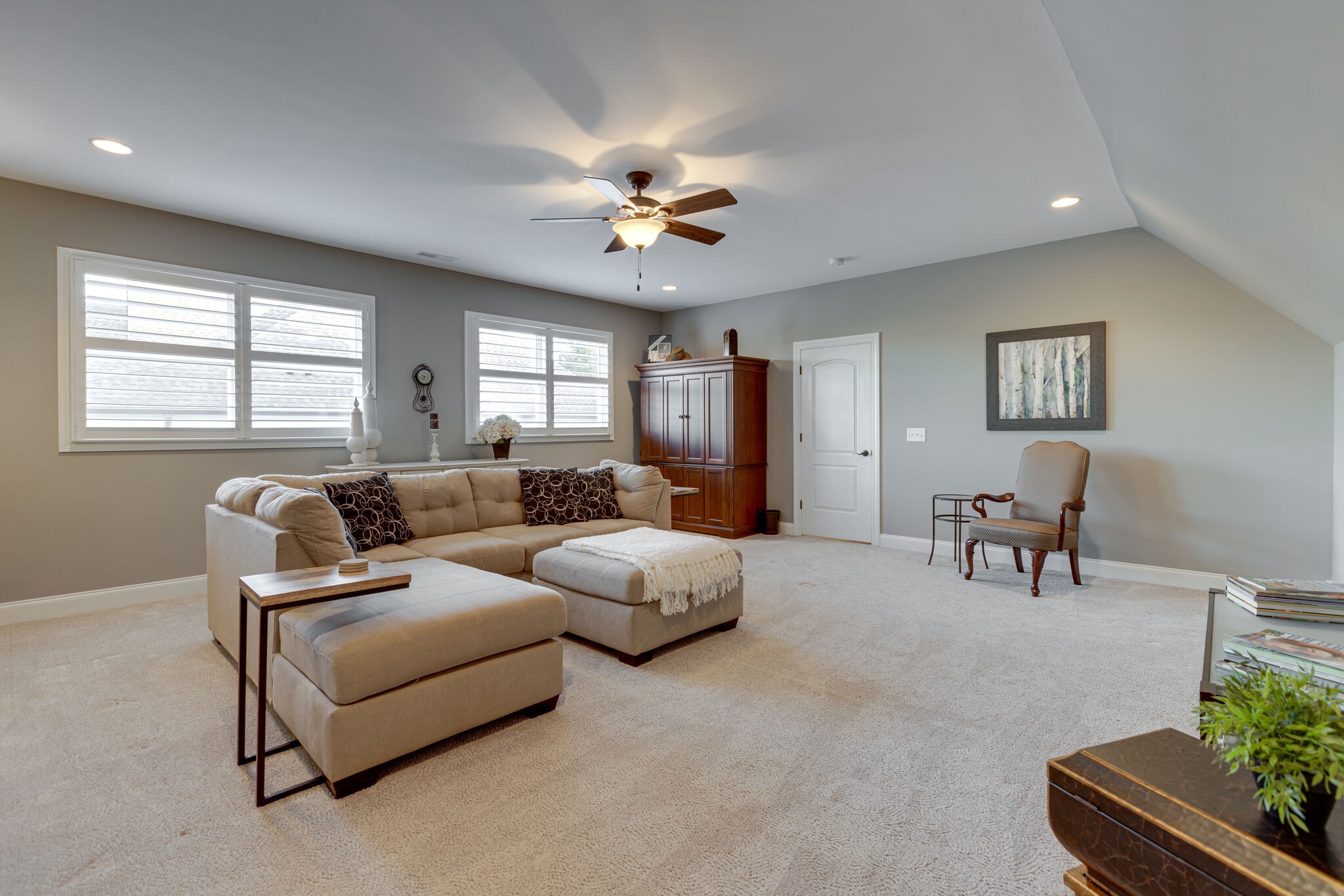 3692 Ronstadt Road Thompson's Station, TN 37179 - Photo 34 of 63 a living room with furniture and a chandelier