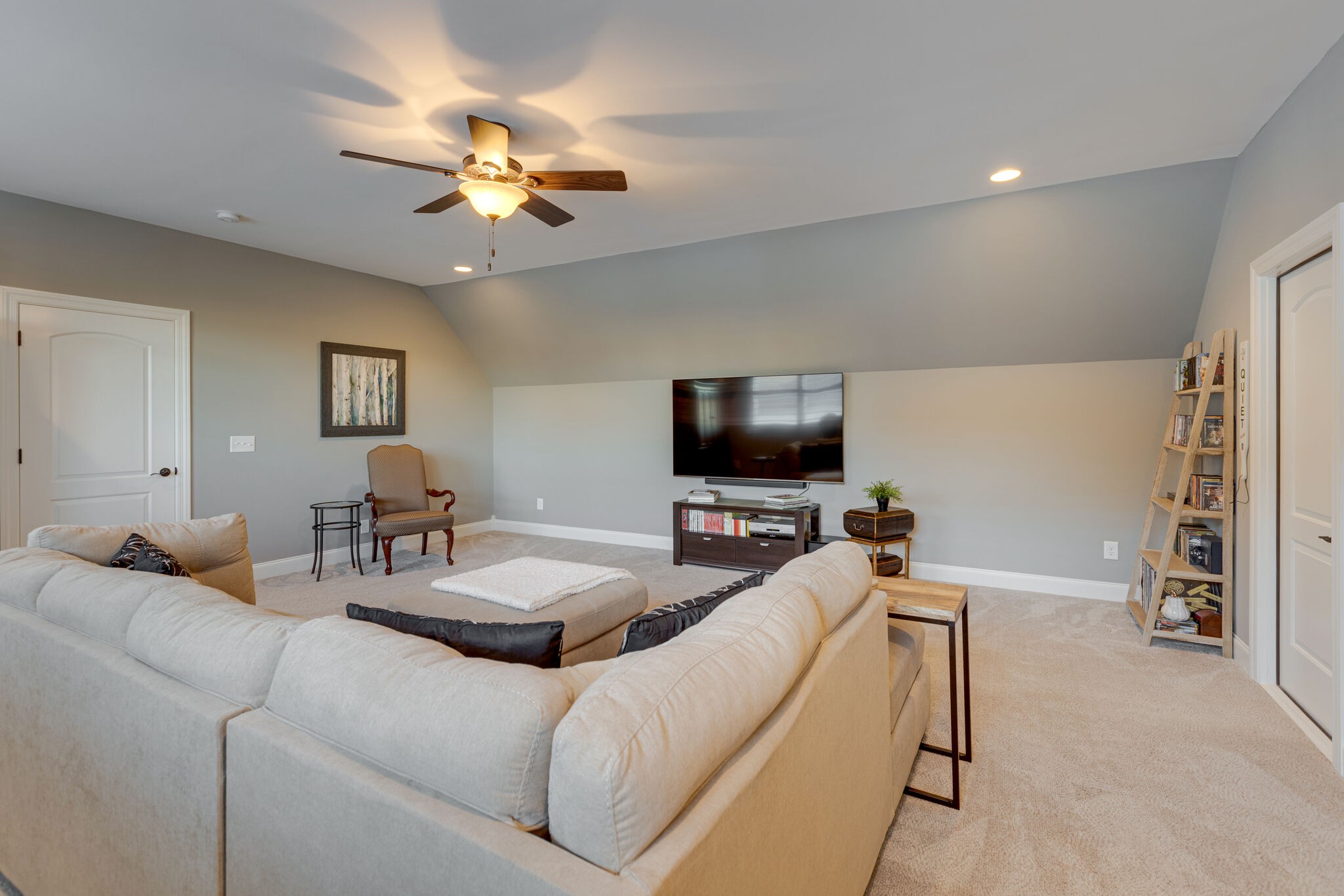 3692 Ronstadt Road Thompson's Station, TN 37179 - Photo 35 of 63 a living room with furniture and a flat screen tv