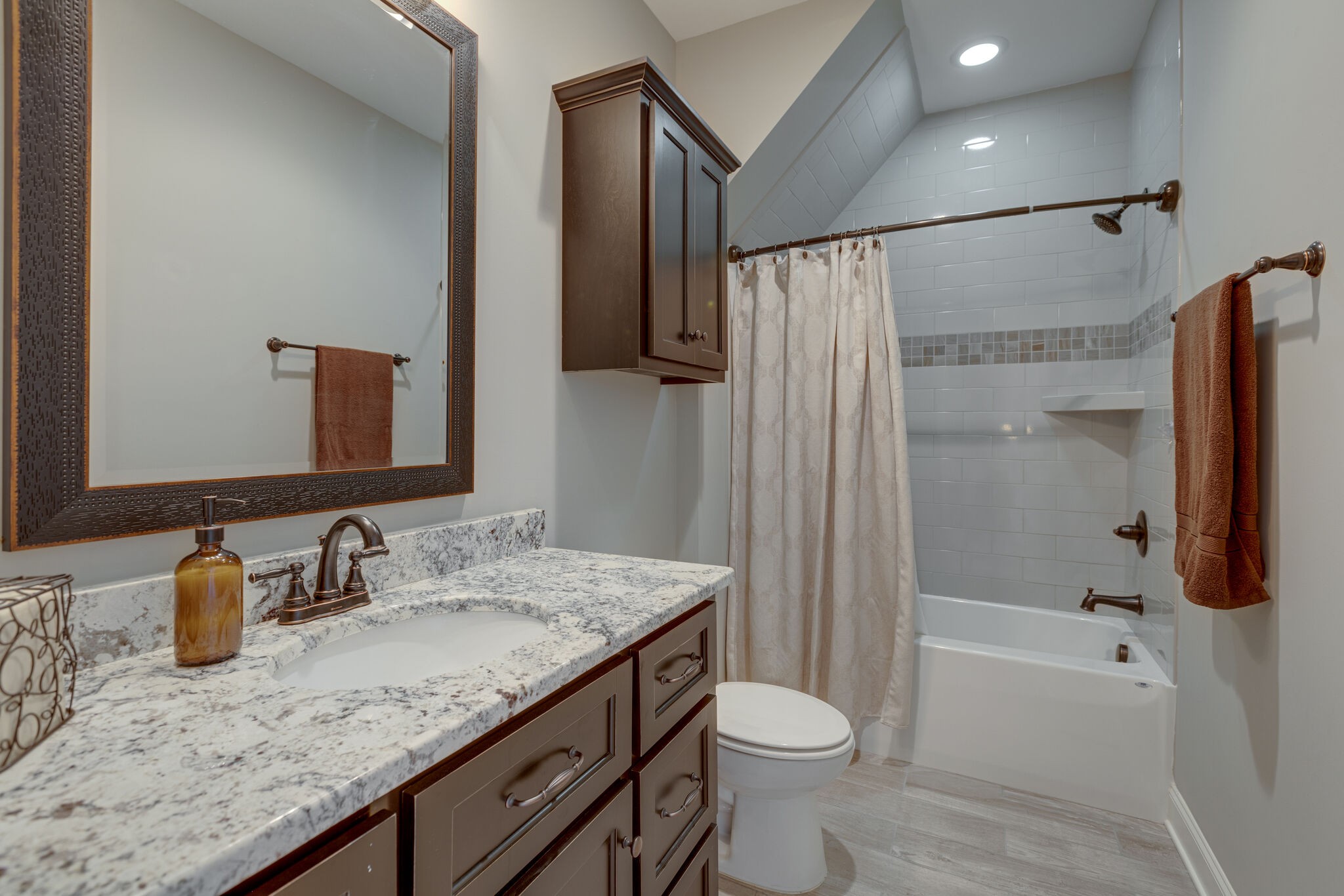 3692 Ronstadt Road Thompson's Station, TN 37179 - Photo 40 of 63 a bathroom with a granite countertop sink toilet and shower