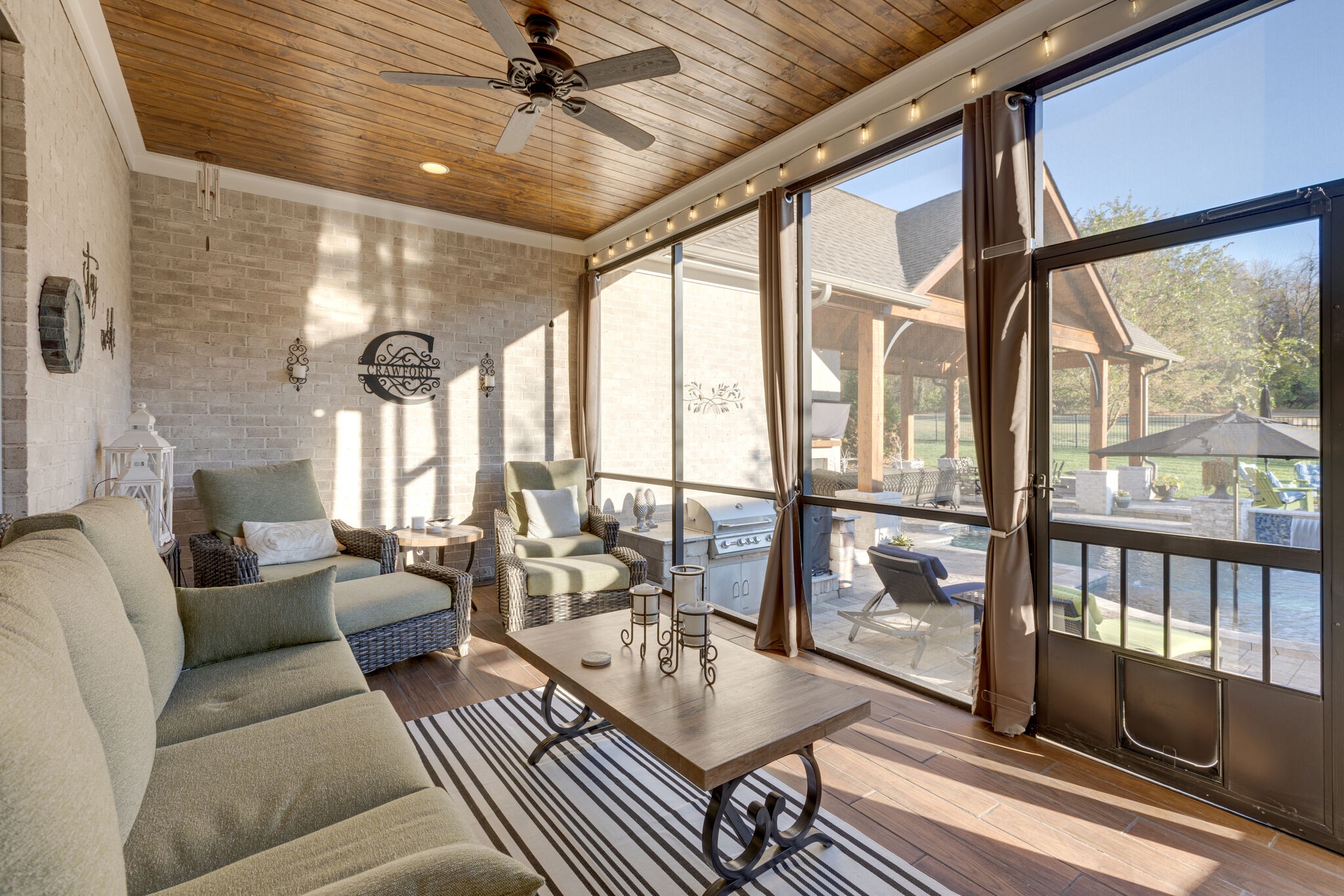 3692 Ronstadt Road Thompson's Station, TN 37179 - Photo 43 of 63 a living room with furniture and a floor to ceiling window