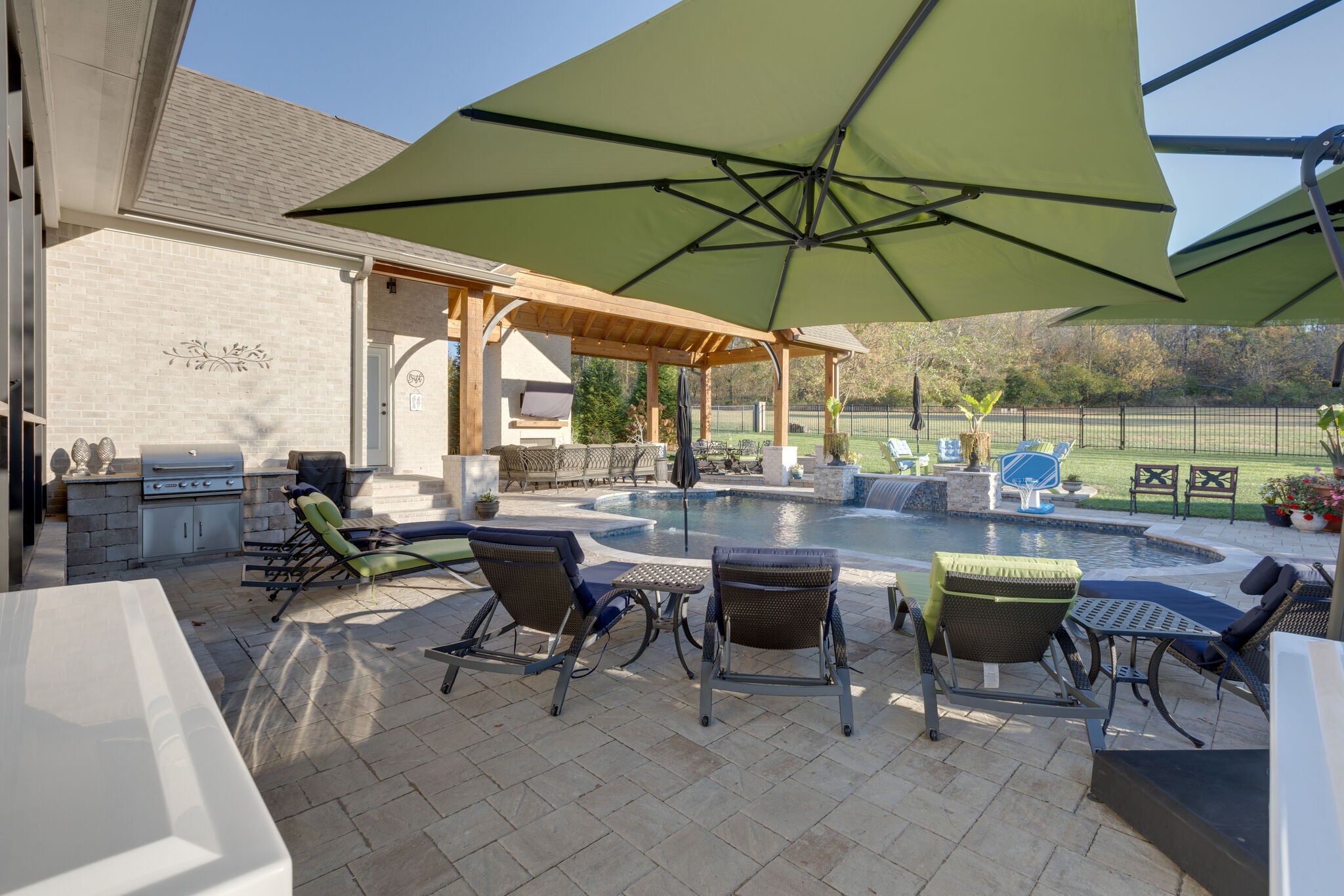 3692 Ronstadt Road Thompson's Station, TN 37179 - Photo 44 of 63 a view of a tables and chairs under an umbrella