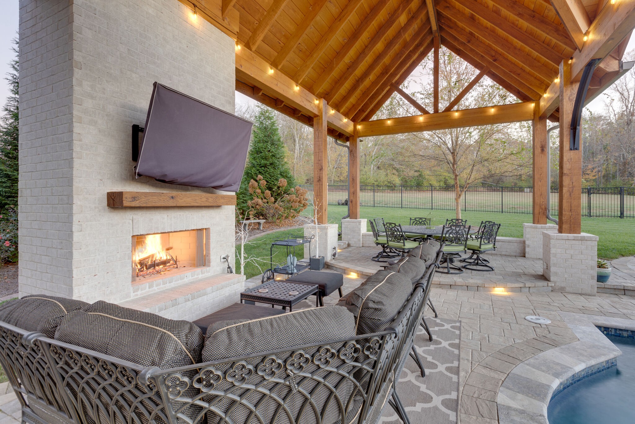 3692 Ronstadt Road Thompson's Station, TN 37179 - Photo 48 of 63 a living room with furniture a fireplace and a large window