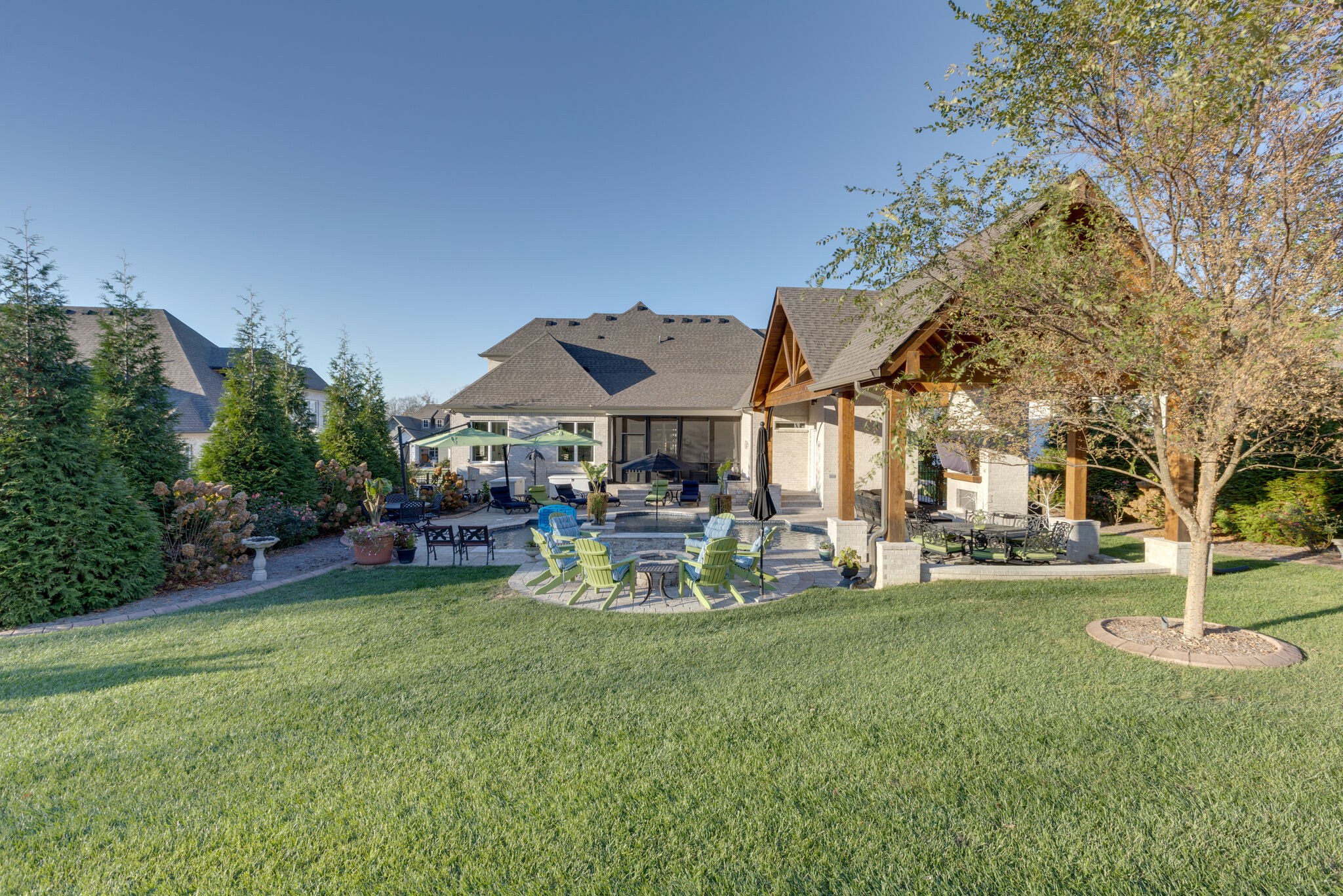 3692 Ronstadt Road Thompson's Station, TN 37179 - Photo 50 of 63 a view of a house with backyard porch and sitting area