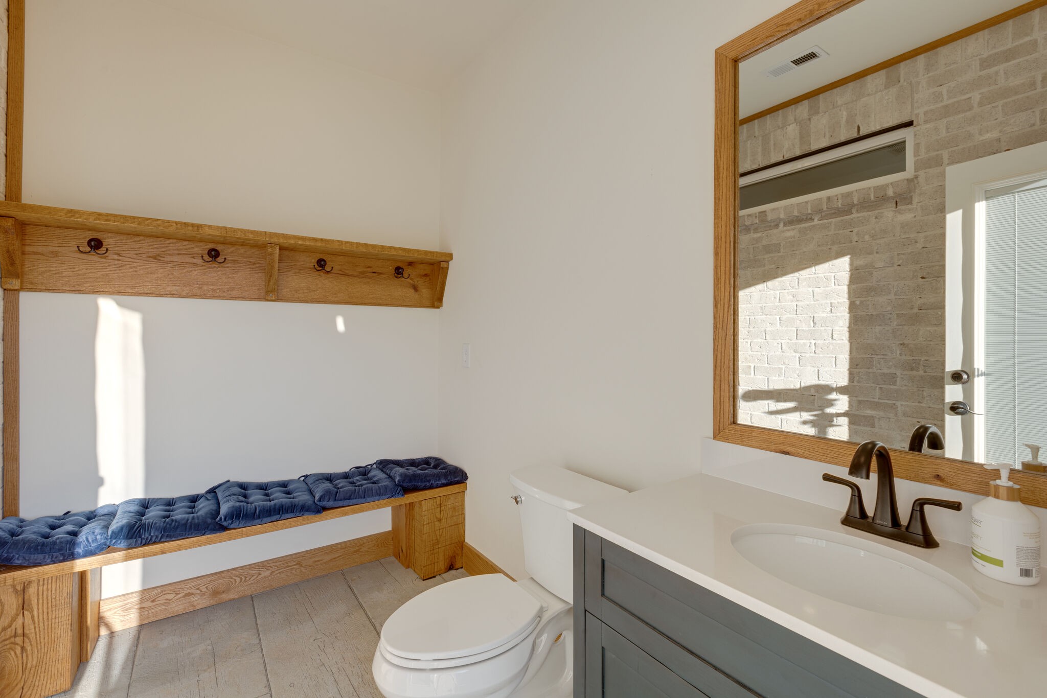 3692 Ronstadt Road Thompson's Station, TN 37179 - Photo 52 of 63 a bathroom with a sink a toilet a window and shower
