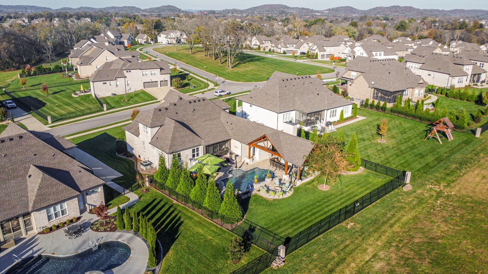 3692 Ronstadt Road Thompson's Station, TN 37179 - Photo 59 of 63 an aerial view of residential houses with outdoor space and parking