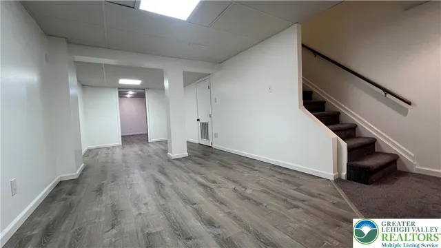 a view of house with yard