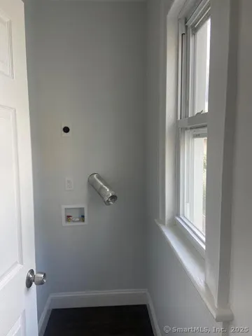 a view of small space with racks on the wall