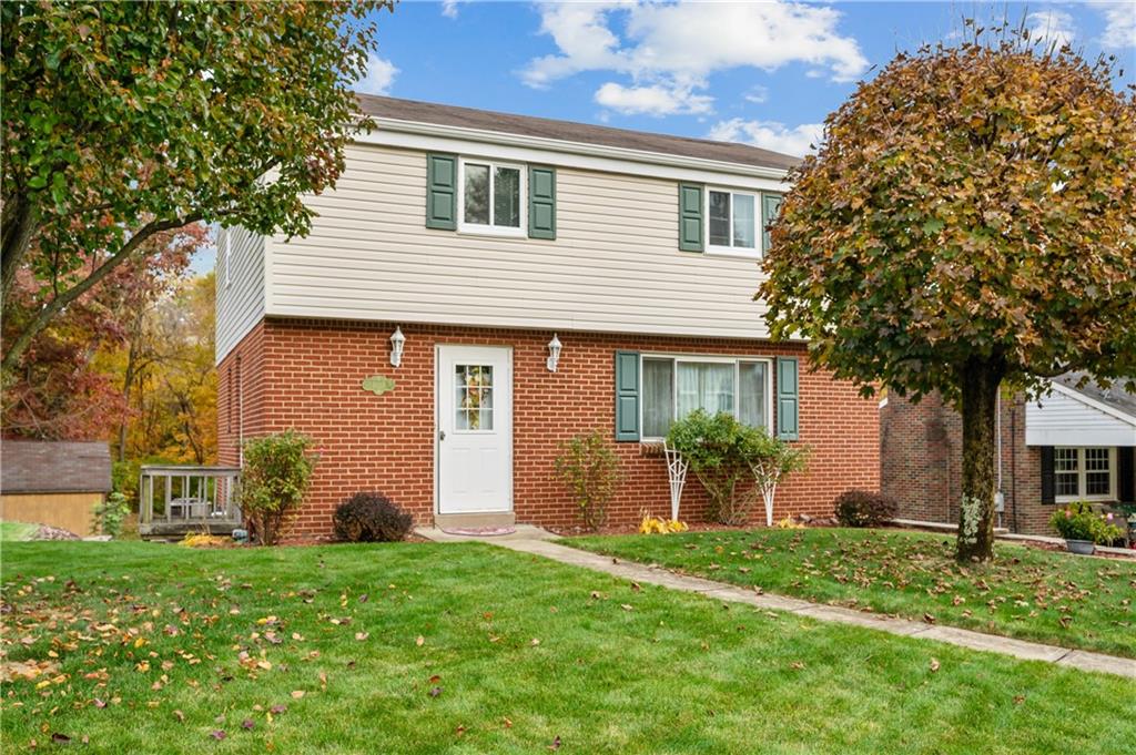 1027 Fiddleback Drive McKees Rocks, PA 15136 - Photo 1 of 25 front view of a house with a yard