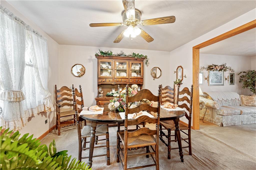 1027 Fiddleback Drive McKees Rocks, PA 15136 - Photo 11 of 25 a view of a dining room with furniture and chandelier